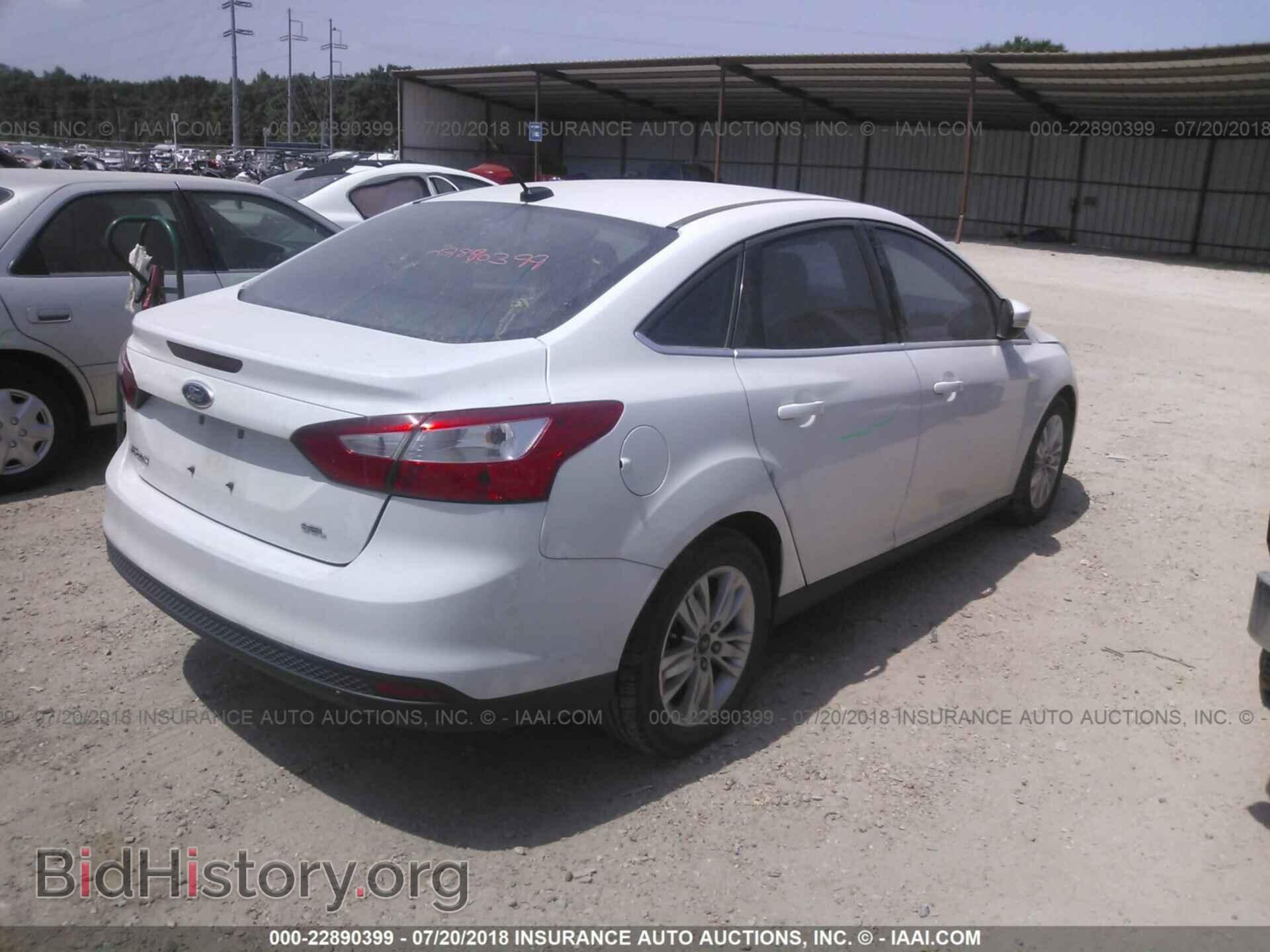 2012 Ford Focus - VIN: 1FAHP3H29CL453659 - Фото 4