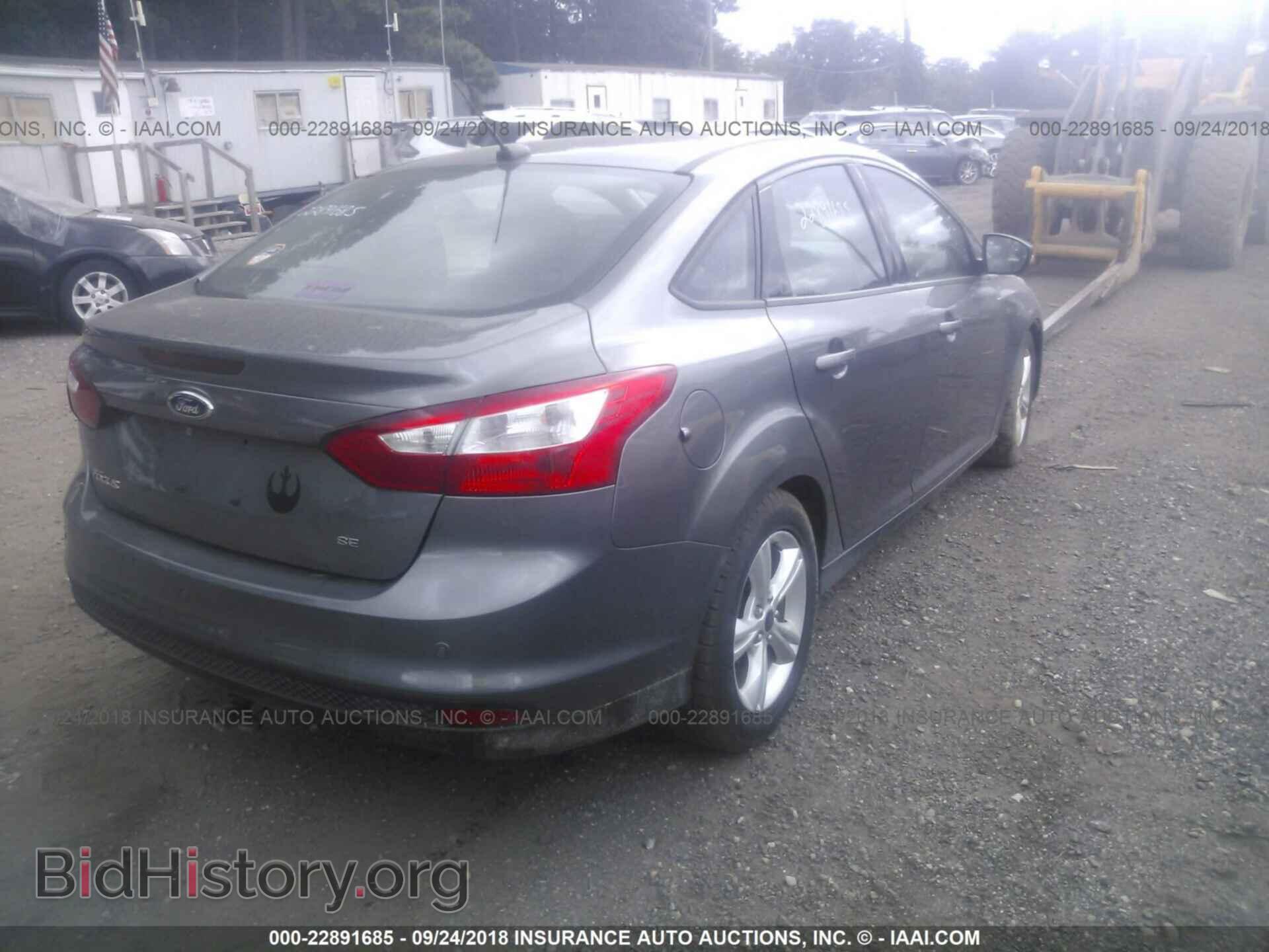 2014 Ford Focus - VIN: 1FADP3F21EL250964 - Фото 4