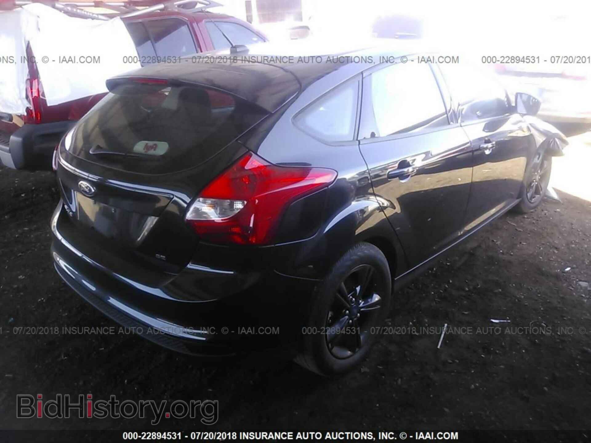 2014 Ford Focus - VIN: 1FADP3K20EL463586 - Photo 4