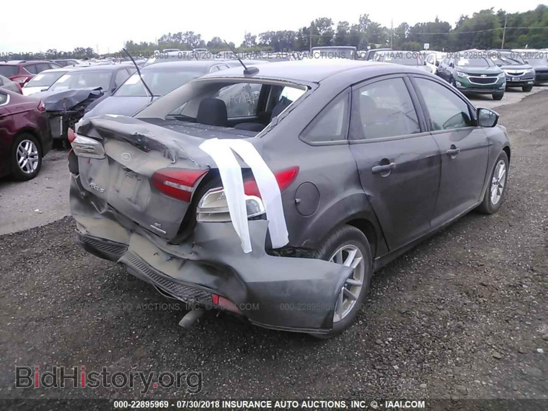 2015 Ford Focus - VIN: 1FADP3F28FL356040 - Photo 4