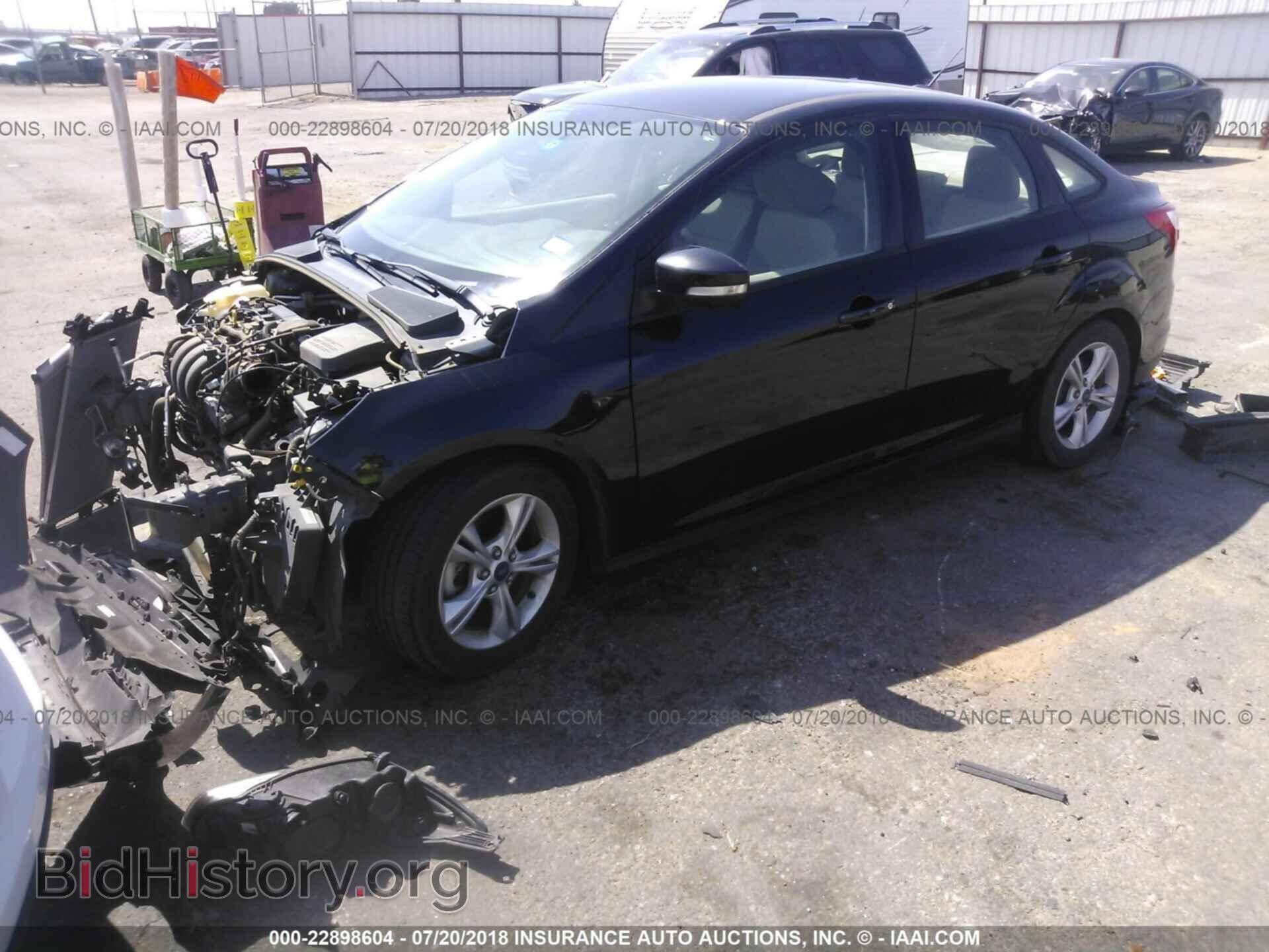 2014 Ford Focus - VIN: 1FADP3F27EL249009 - Фото 2