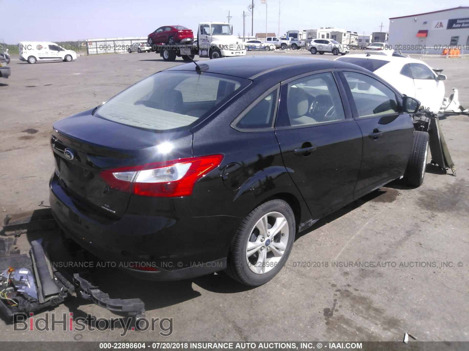 2014 Ford Focus - VIN: 1FADP3F27EL249009 - Фото 4