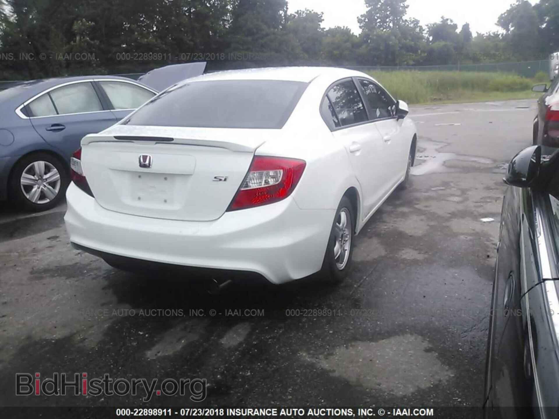 2012 Honda CIVIC (VIN 2HGFB6E5XCH702596) — фото 4 из 10