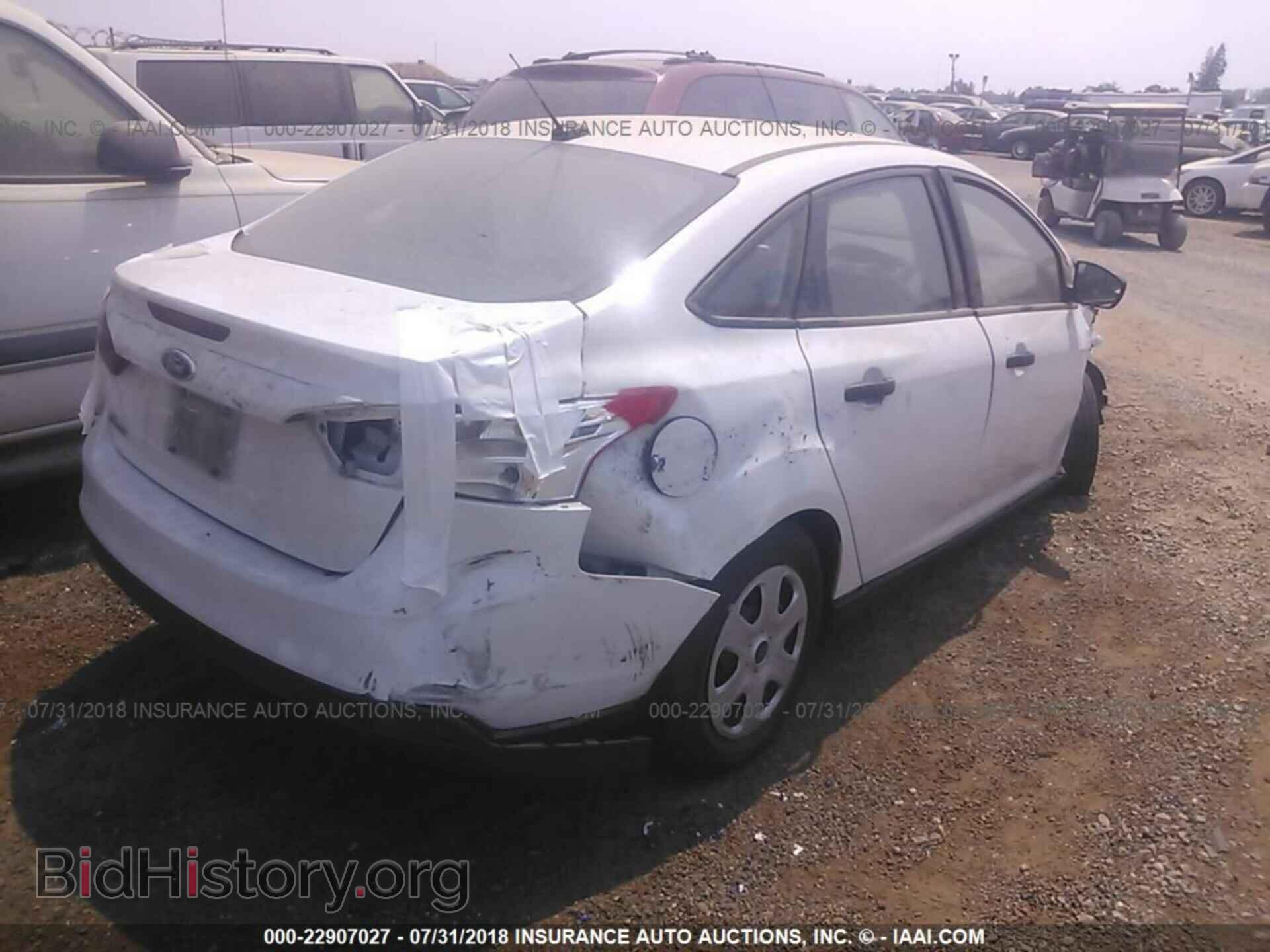 2014 Ford Focus - VIN: 1FADP3E28EL462701 - Фото 4