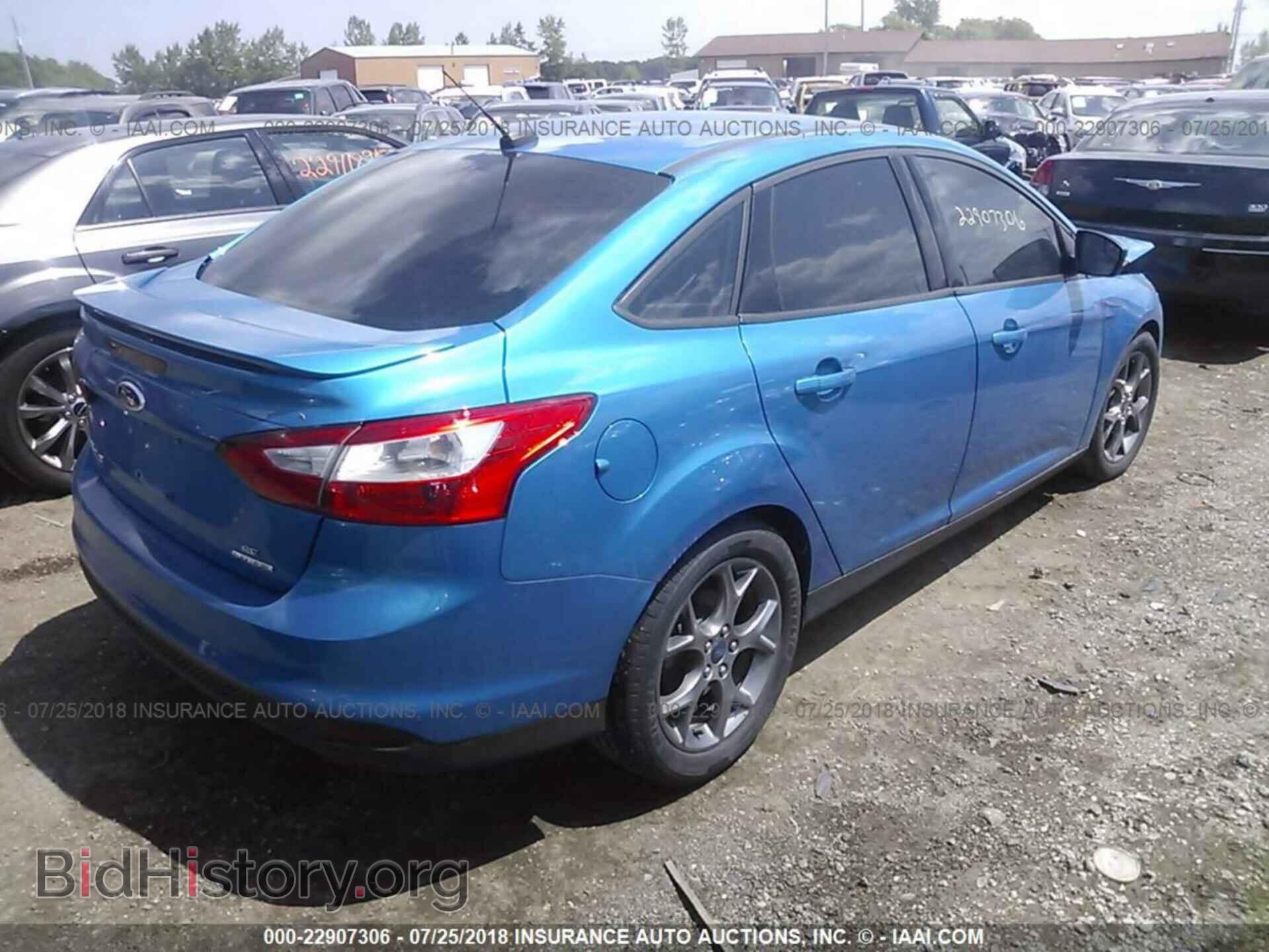 2014 Ford Focus - VIN: 1FADP3F25EL371626 - Фото 4