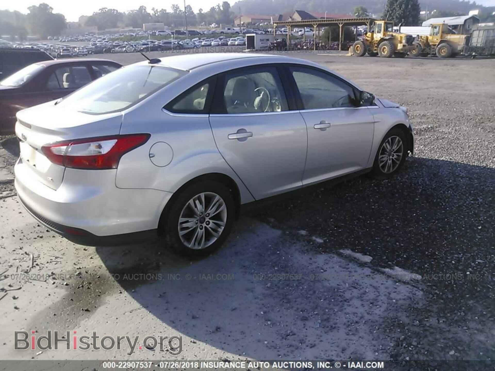 2012 Ford Focus - VIN: 1FAHP3H20CL142153 - Photo 4