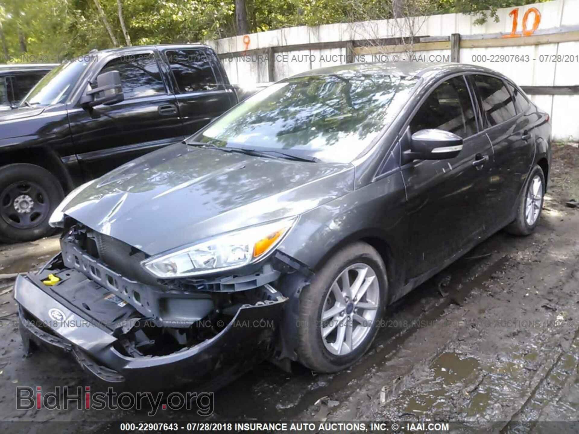 2015 Ford Focus - VIN: 1FADP3F20FL244140 - Фото 2