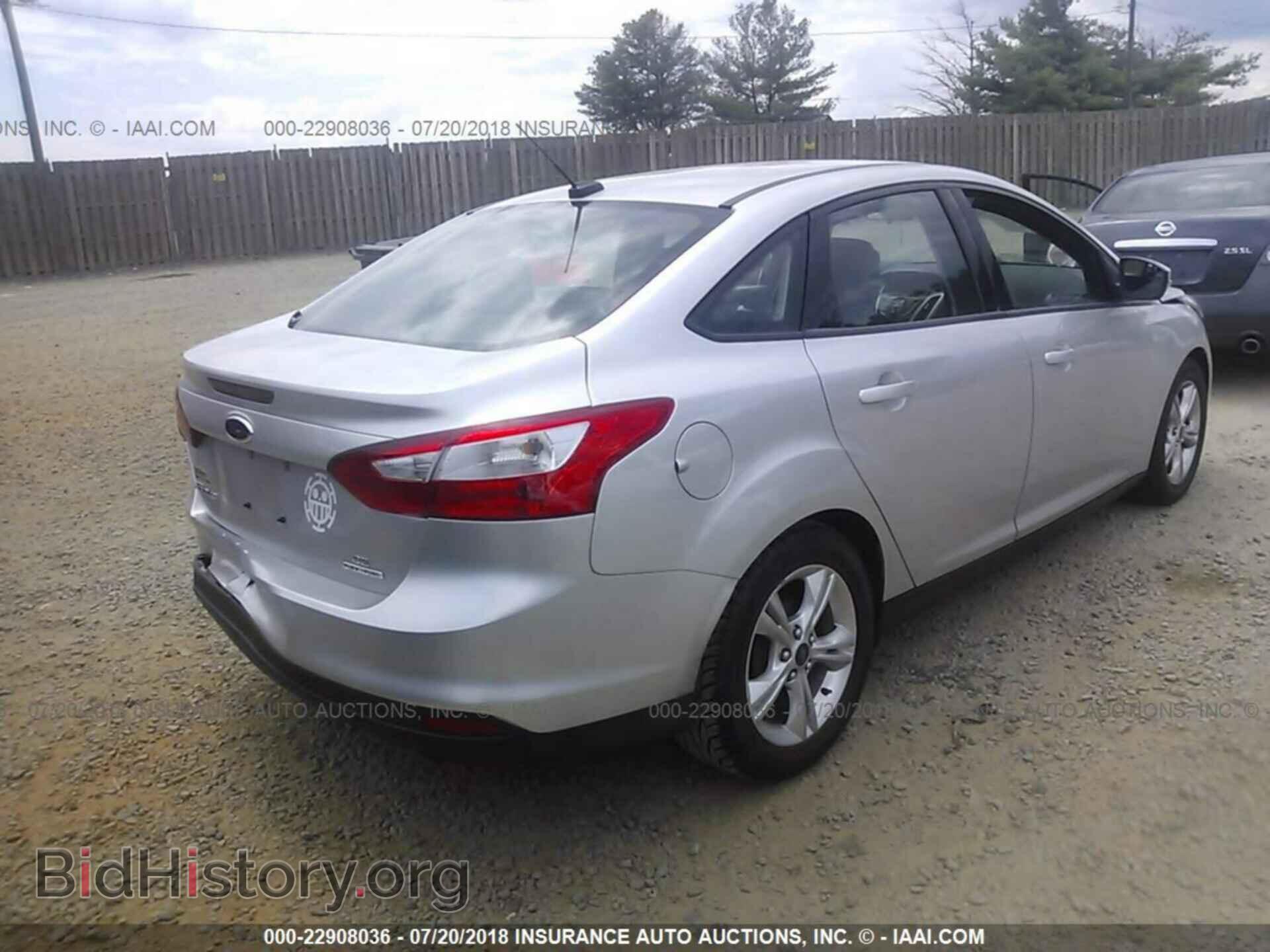2014 Ford Focus - VIN: 1FADP3F20EL180695 - Фото 4