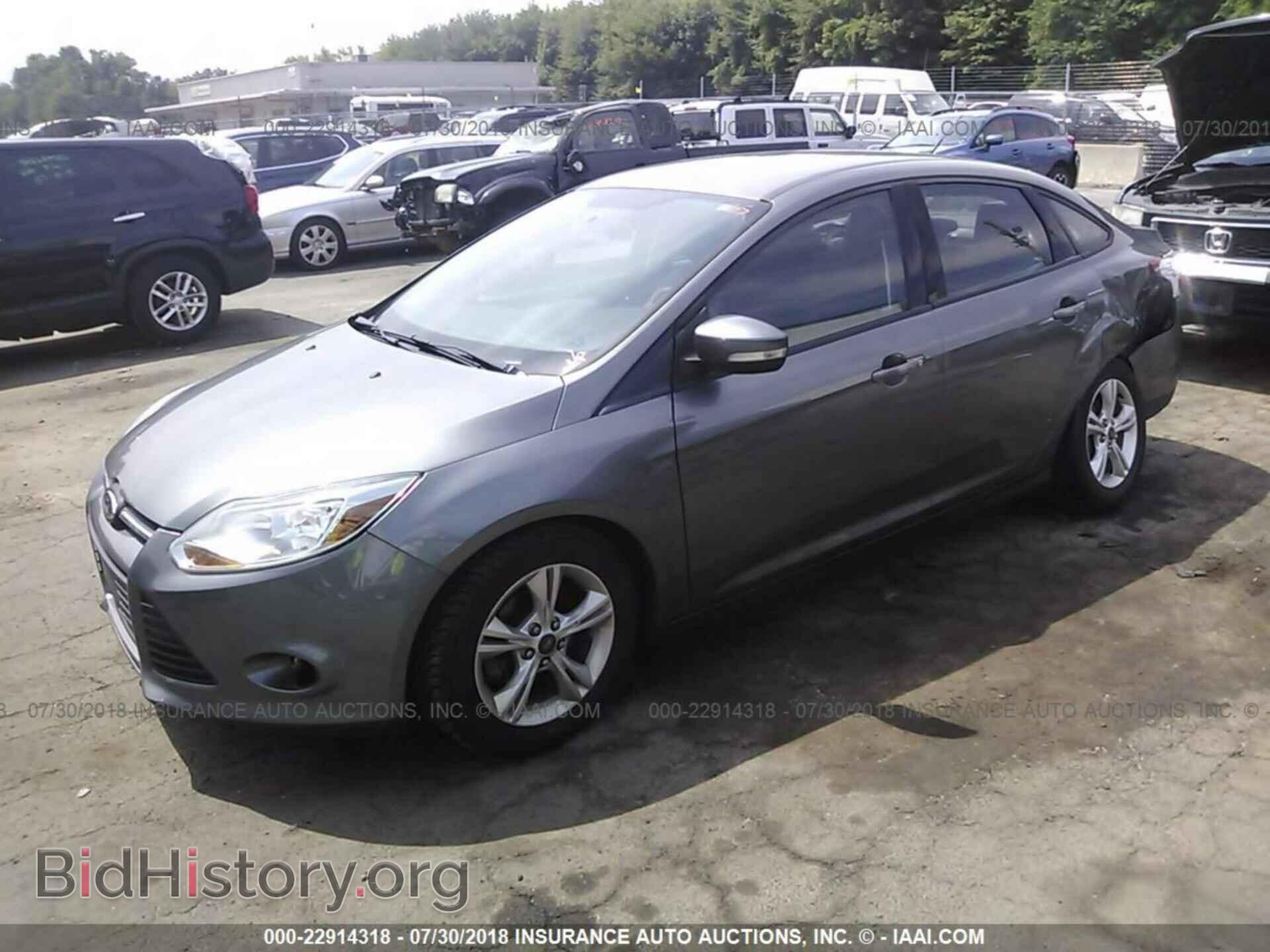 2014 Ford Focus - VIN: 1FADP3F22EL134365 - Фото 2