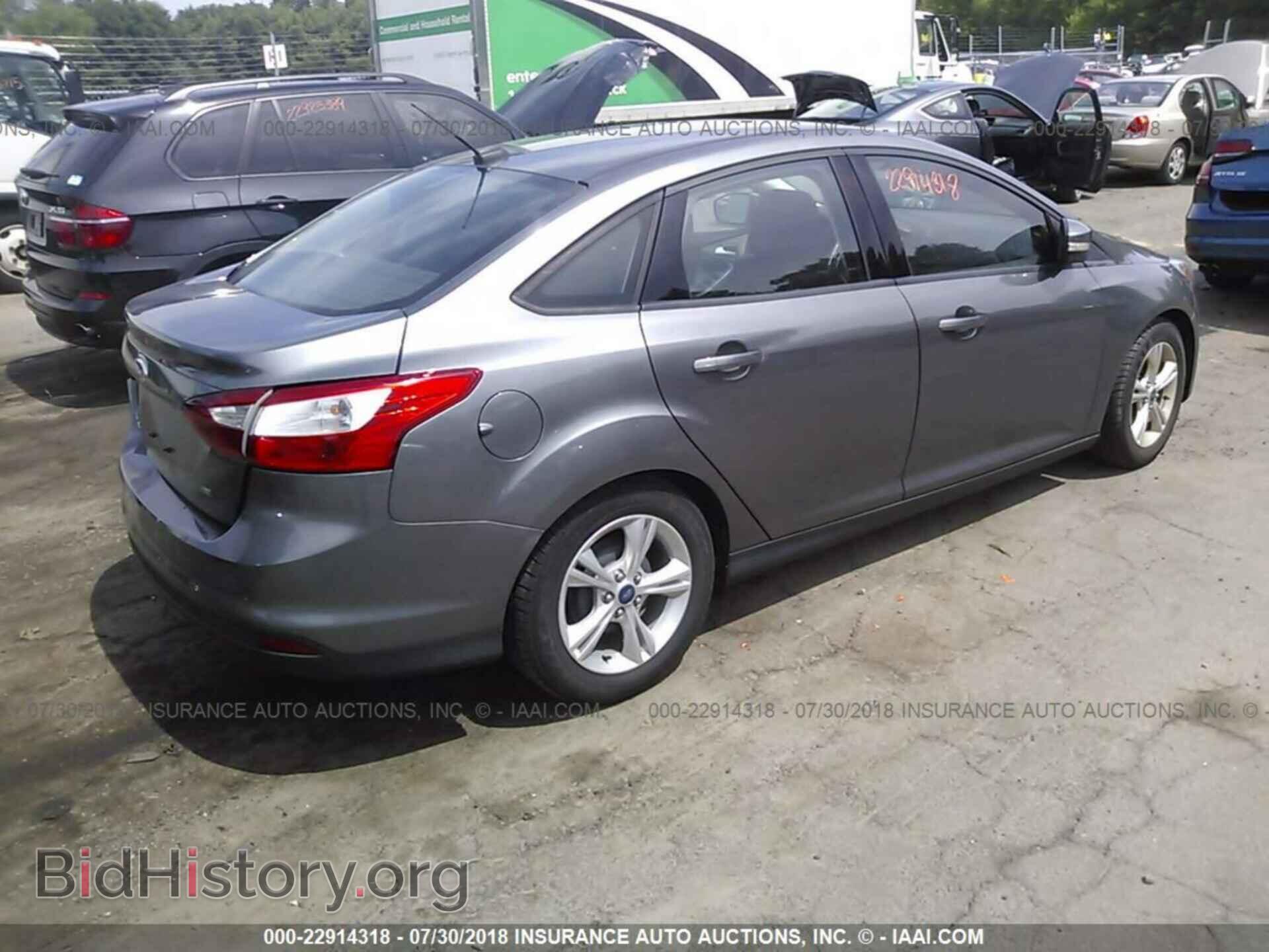 2014 Ford Focus - VIN: 1FADP3F22EL134365 - Фото 4
