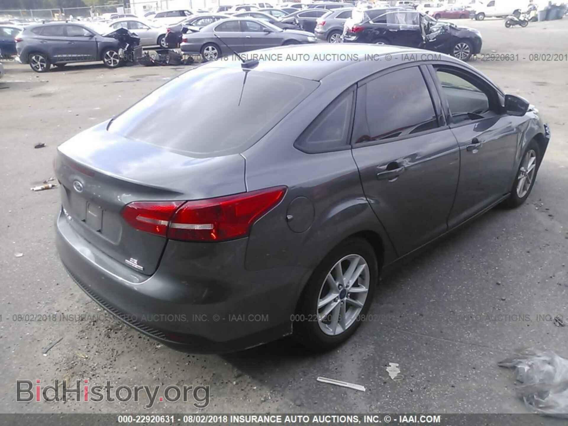 2015 Ford Focus - VIN: 1FADP3F22FL214430 - Photo 4