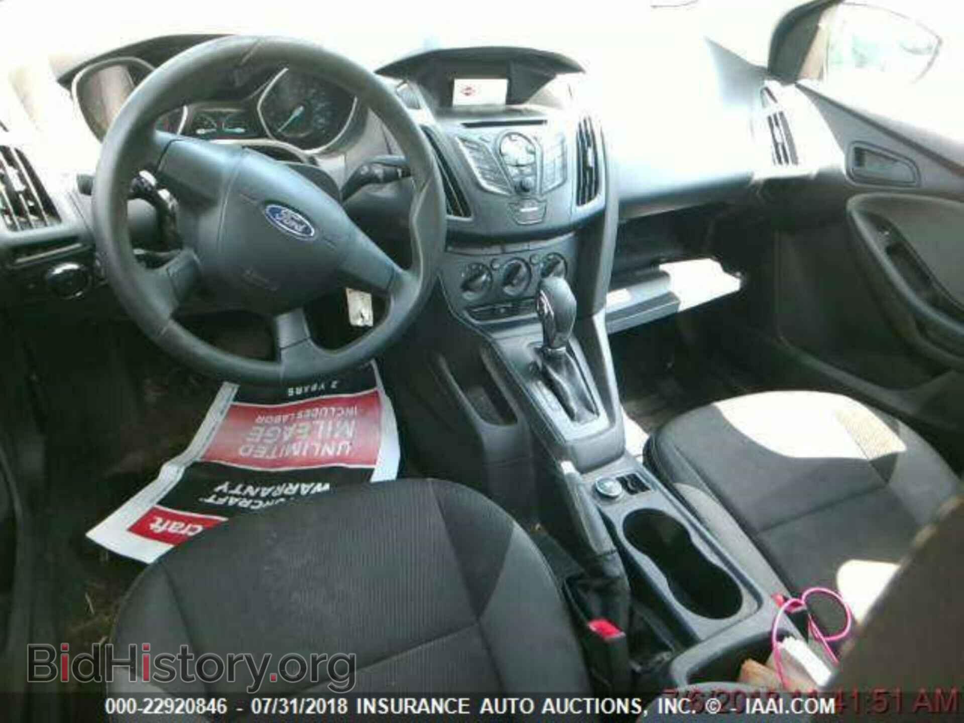 2014 Ford Focus - VIN: 1FADP3E21EL351309 - Photo 4