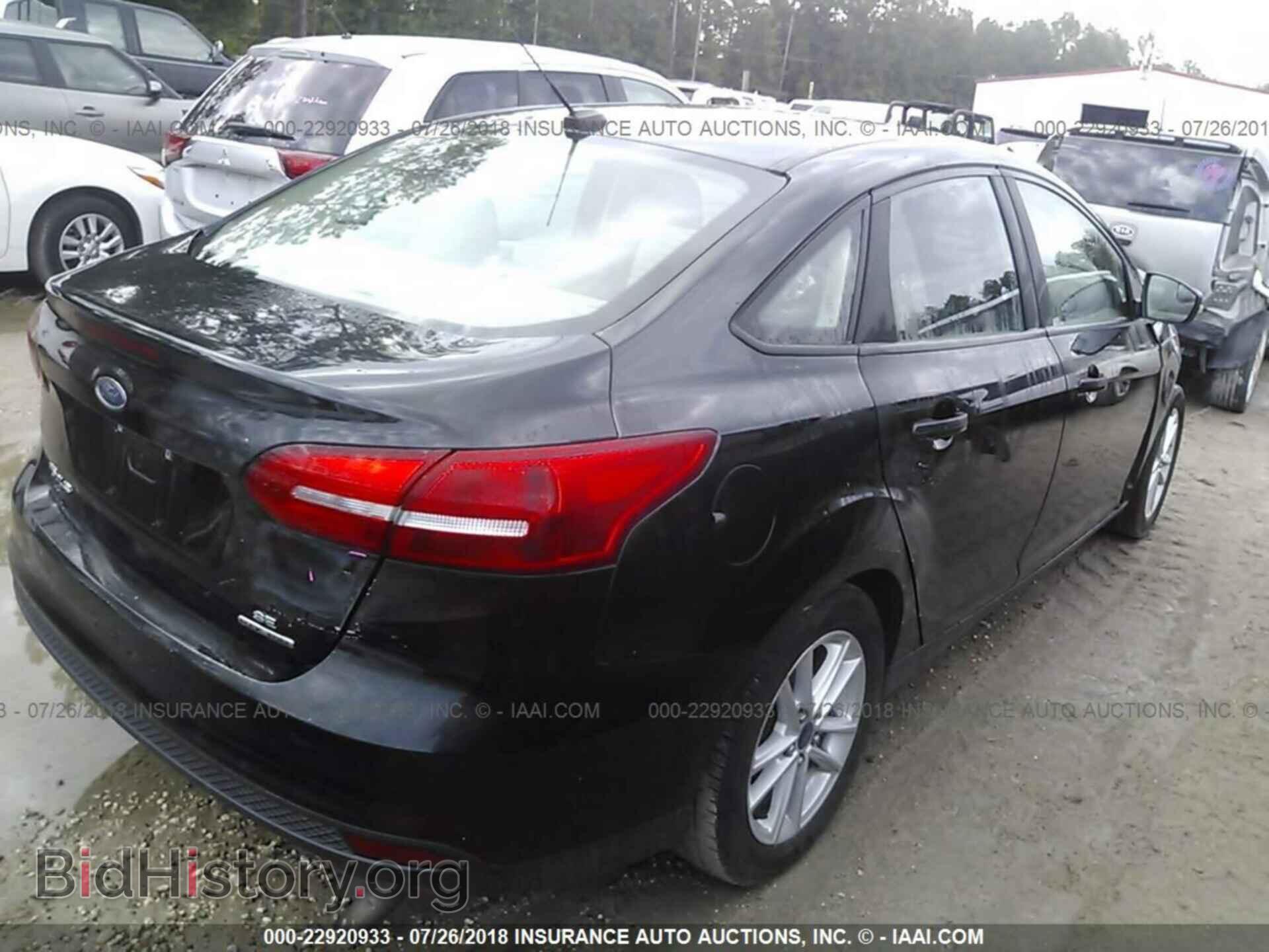 2015 Ford Focus - VIN: 1FADP3F24FL263063 - Photo 4