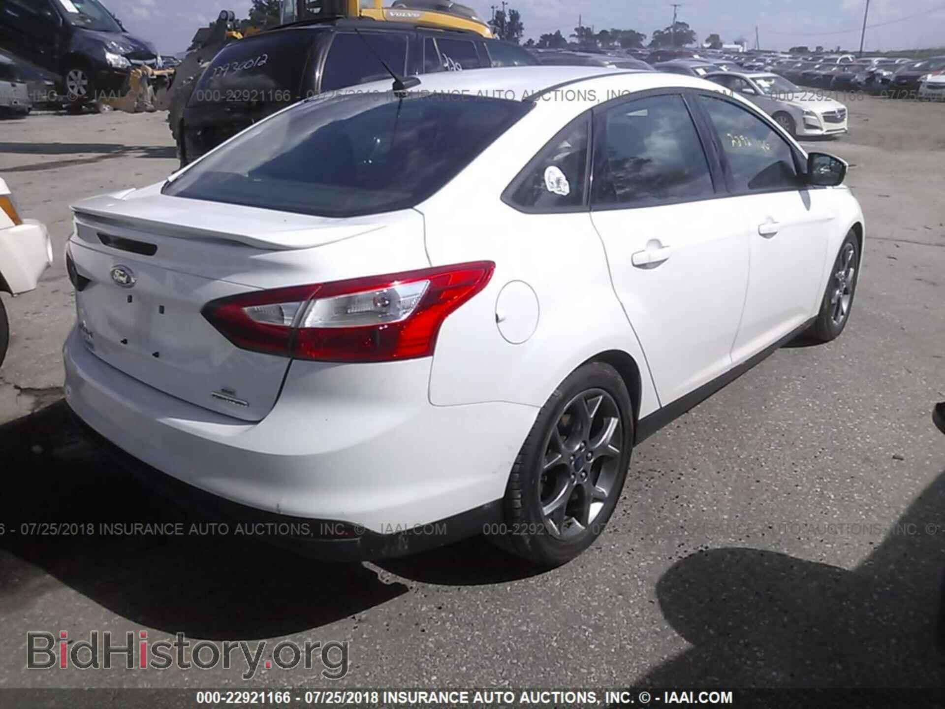 2014 Ford Focus - VIN: 1FADP3F23EL331836 - Photo 4