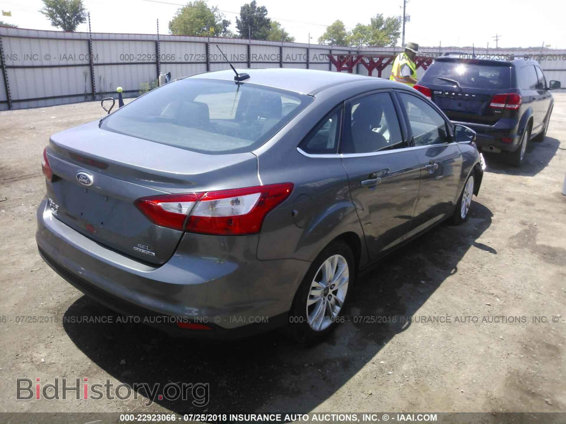 2012 Ford Focus - VIN: 1FAHP3H24CL371872 - Фото 4