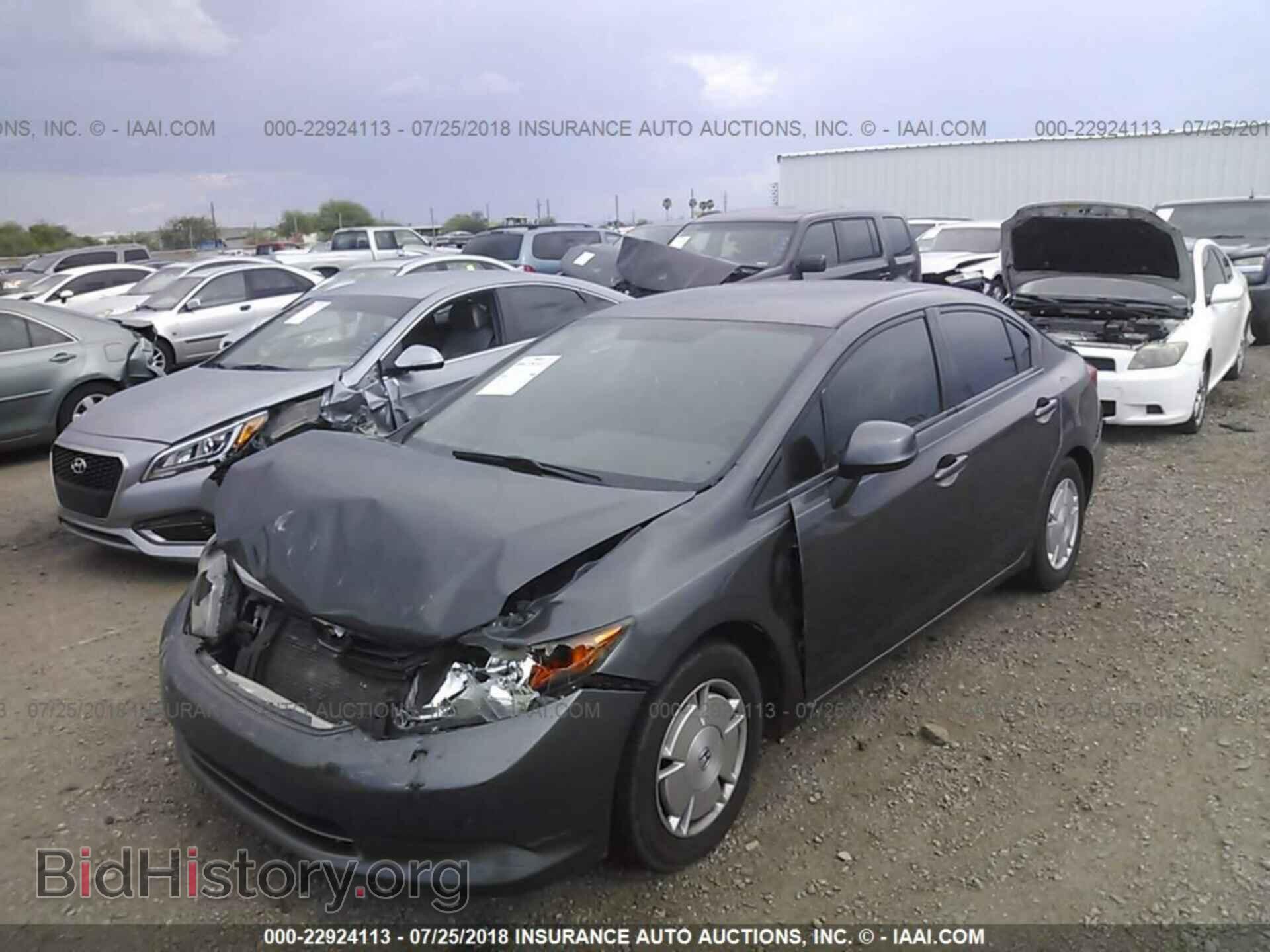 2012 Honda Civic - VIN: 2HGFB2F67CH556383 - Photo 2