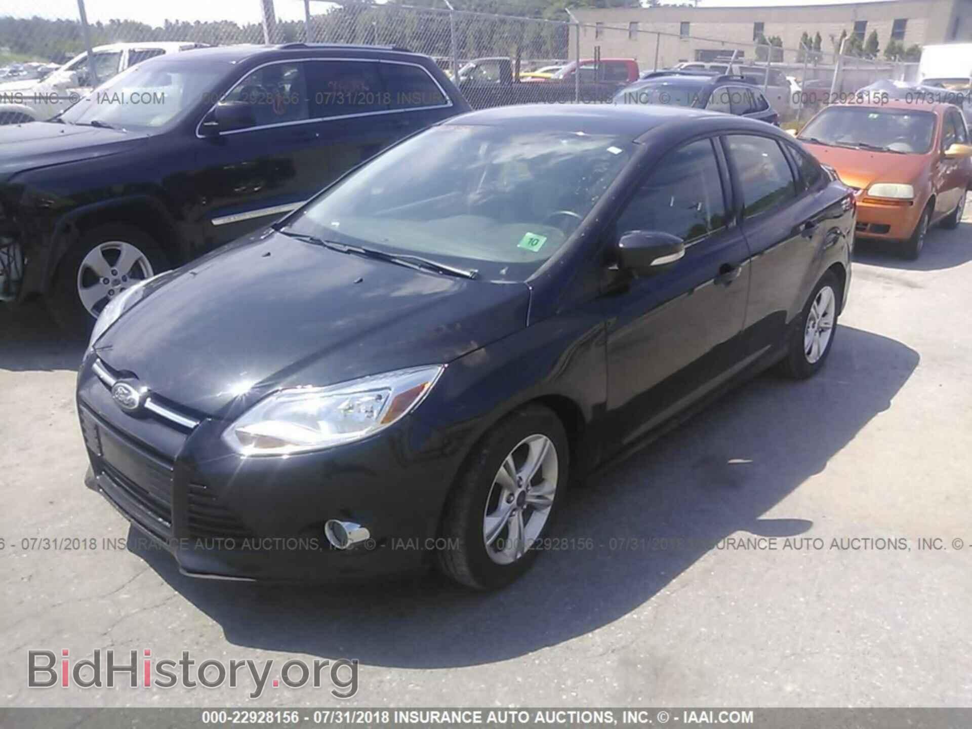 2012 Ford Focus - VIN: 1FAHP3F28CL398897 - Photo 2