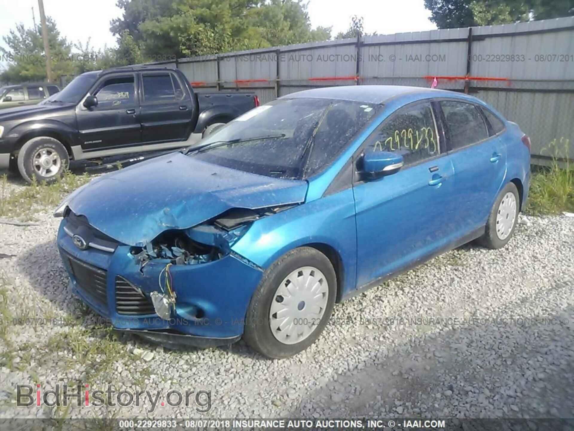 2014 Ford Focus - VIN: 1FADP3F22EL412066 - Photo 2