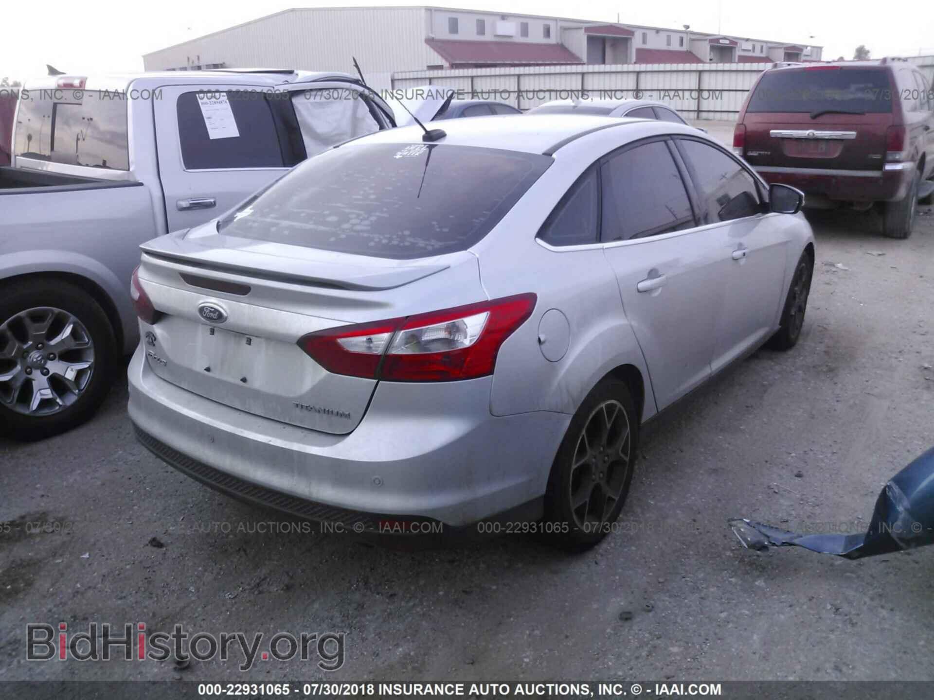 2012 Ford Focus - VIN: 1FAHP3J25CL304482 - Photo 4