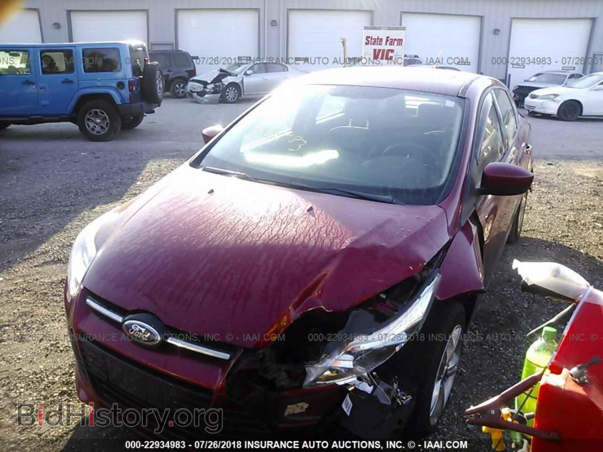 2012 Ford Focus - VIN: 1FAHP3F20CL319710 - Фото 2