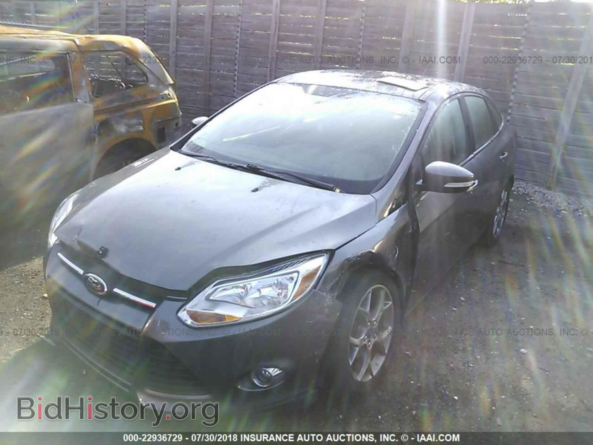 2014 Ford Focus - VIN: 1FADP3F20EL337125 - Фото 2