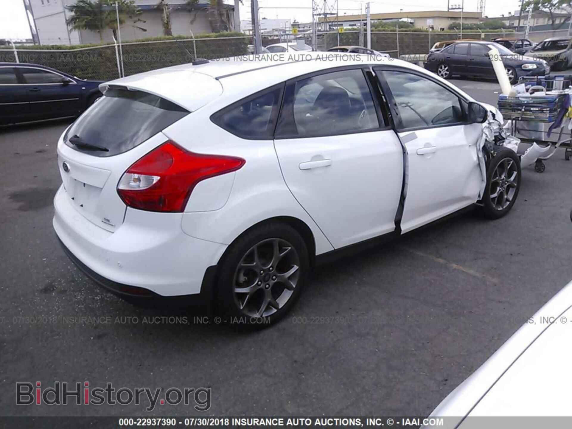 2014 Ford Focus - VIN: 1FADP3K21EL303524 - Photo 4