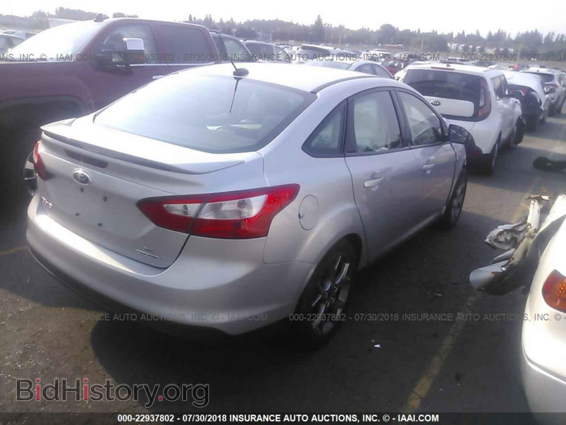 2014 Ford Focus - VIN: 1FADP3F27EL433673 - Photo 4