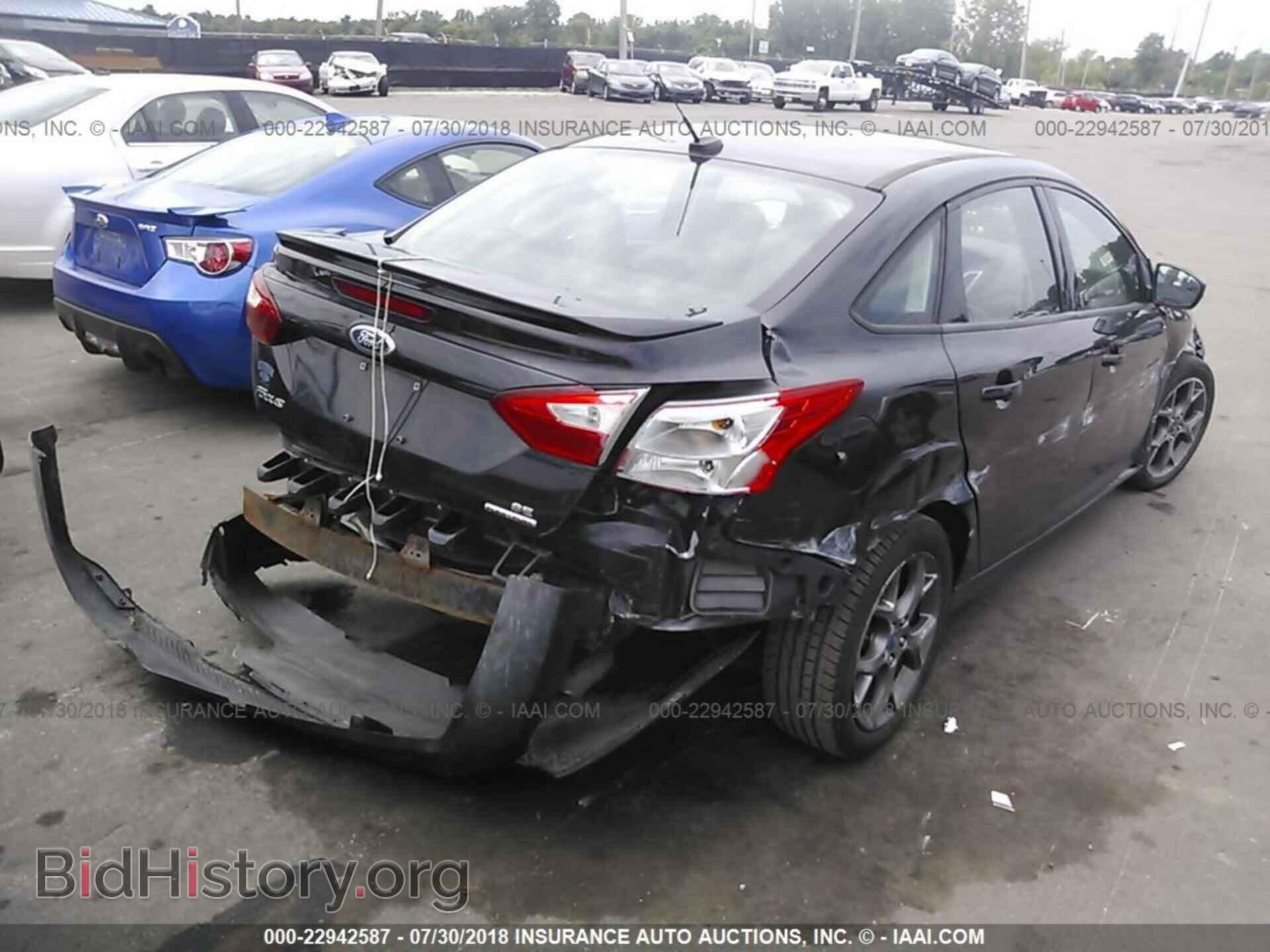 2013 Ford Focus - VIN: 1FADP3F2XDL236513 - Photo 4