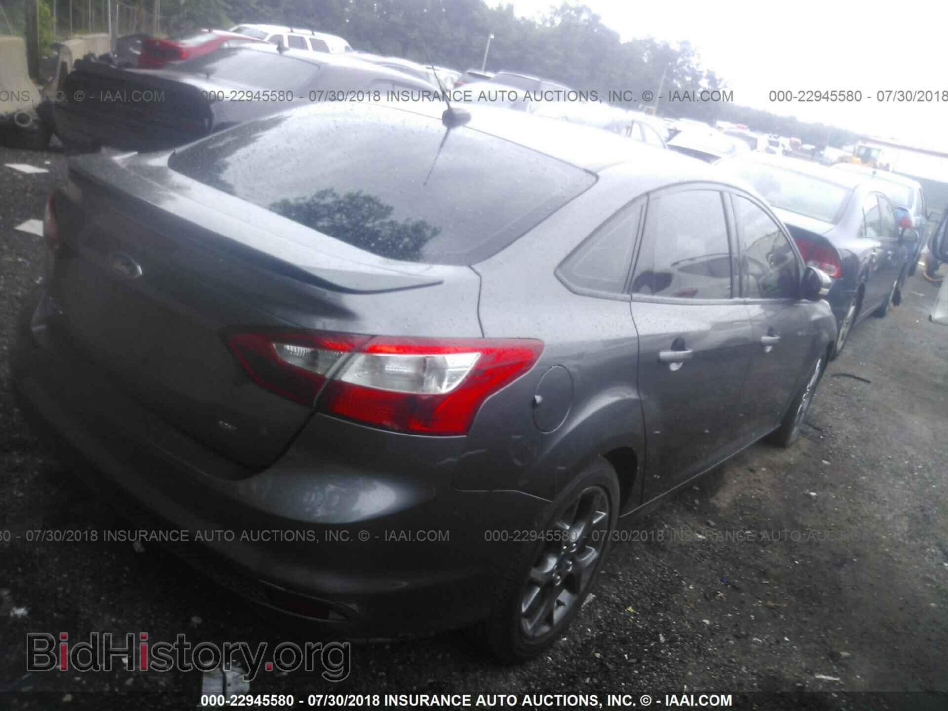 2014 Ford Focus - VIN: 1FADP3F20EL307073 - Фото 4