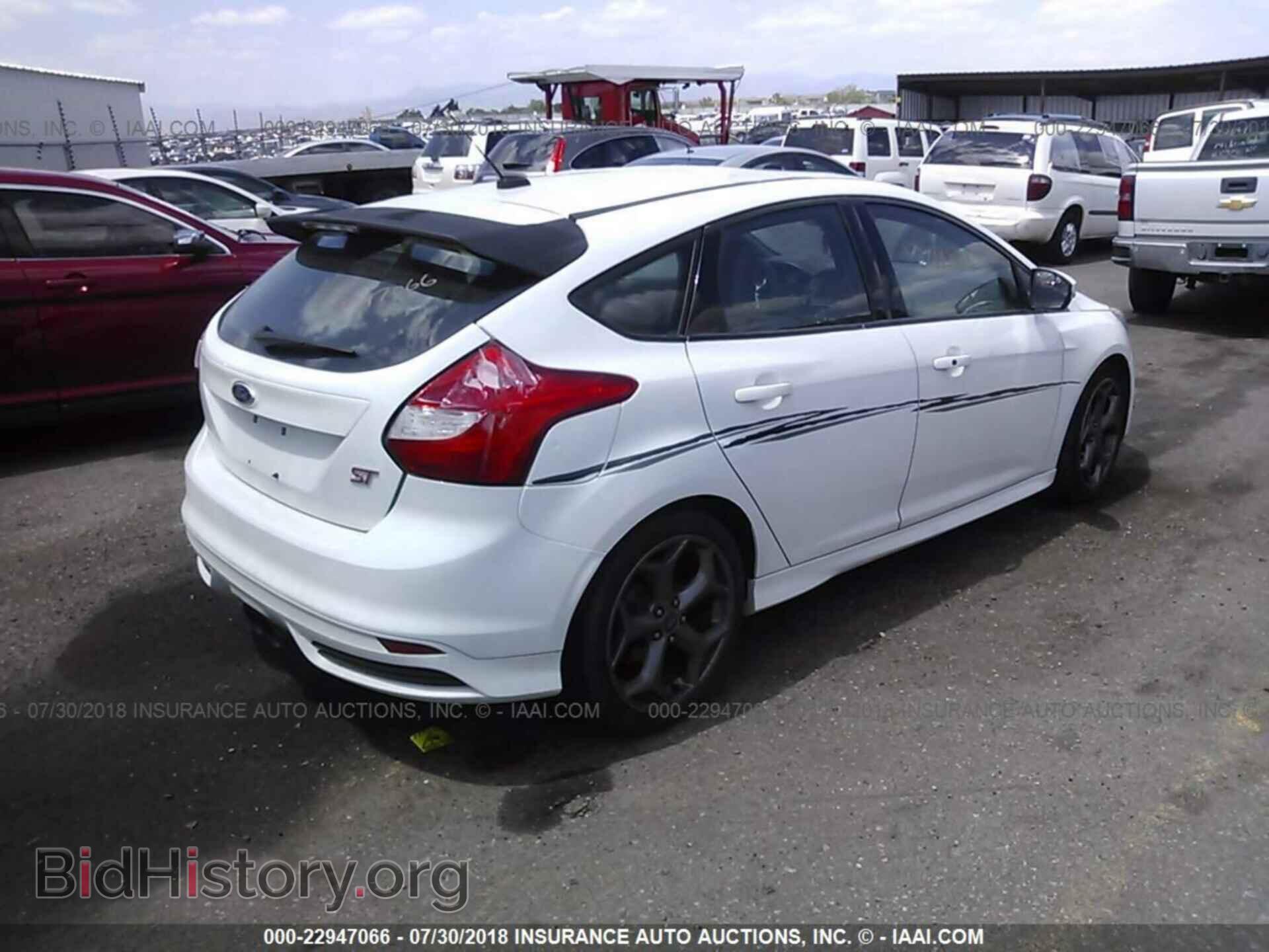 2014 Ford Focus - VIN: 1FADP3L97EL345692 - Фото 4
