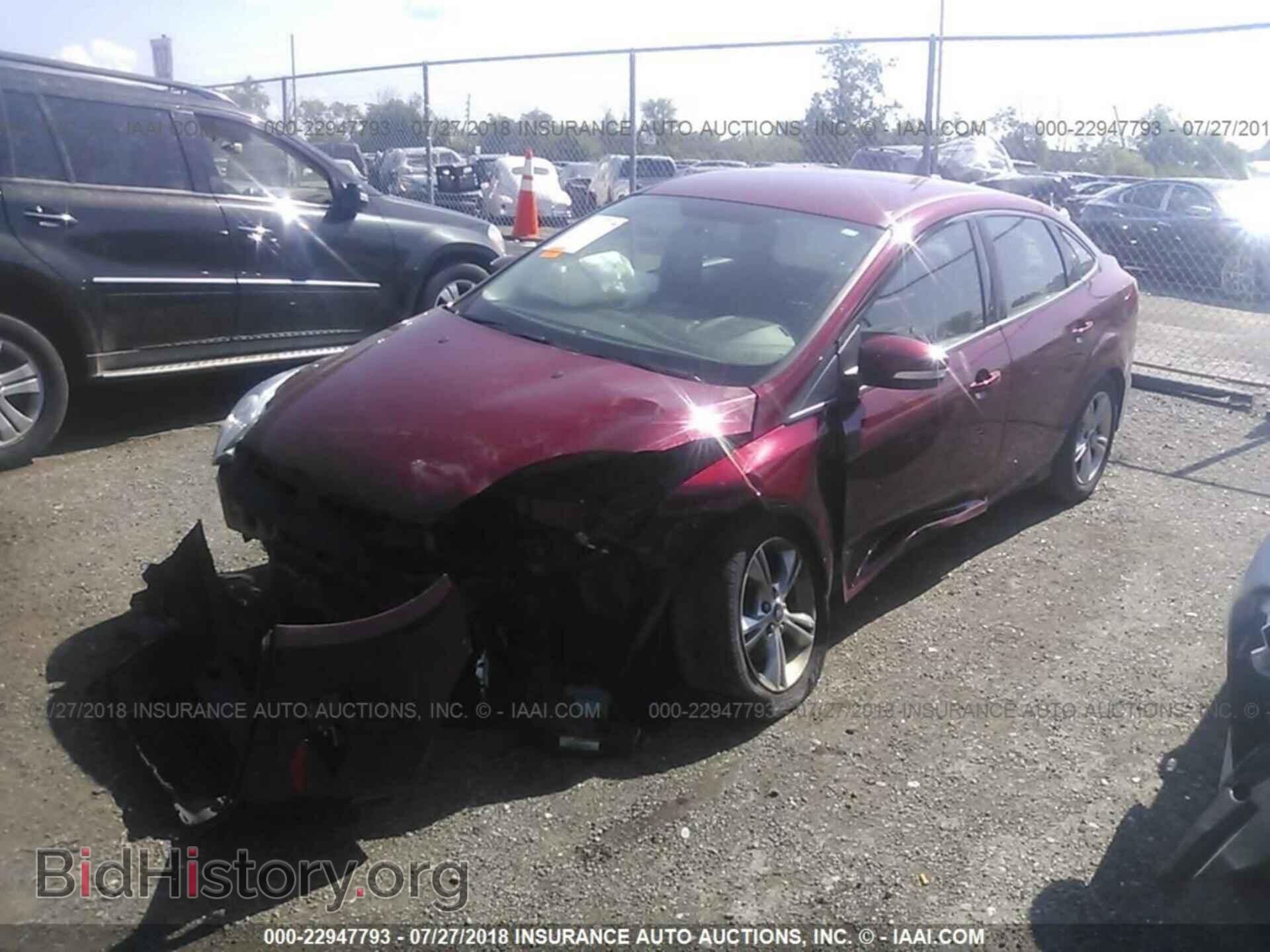 2014 Ford Focus - VIN: 1FADP3F23EL354243 - Фото 2