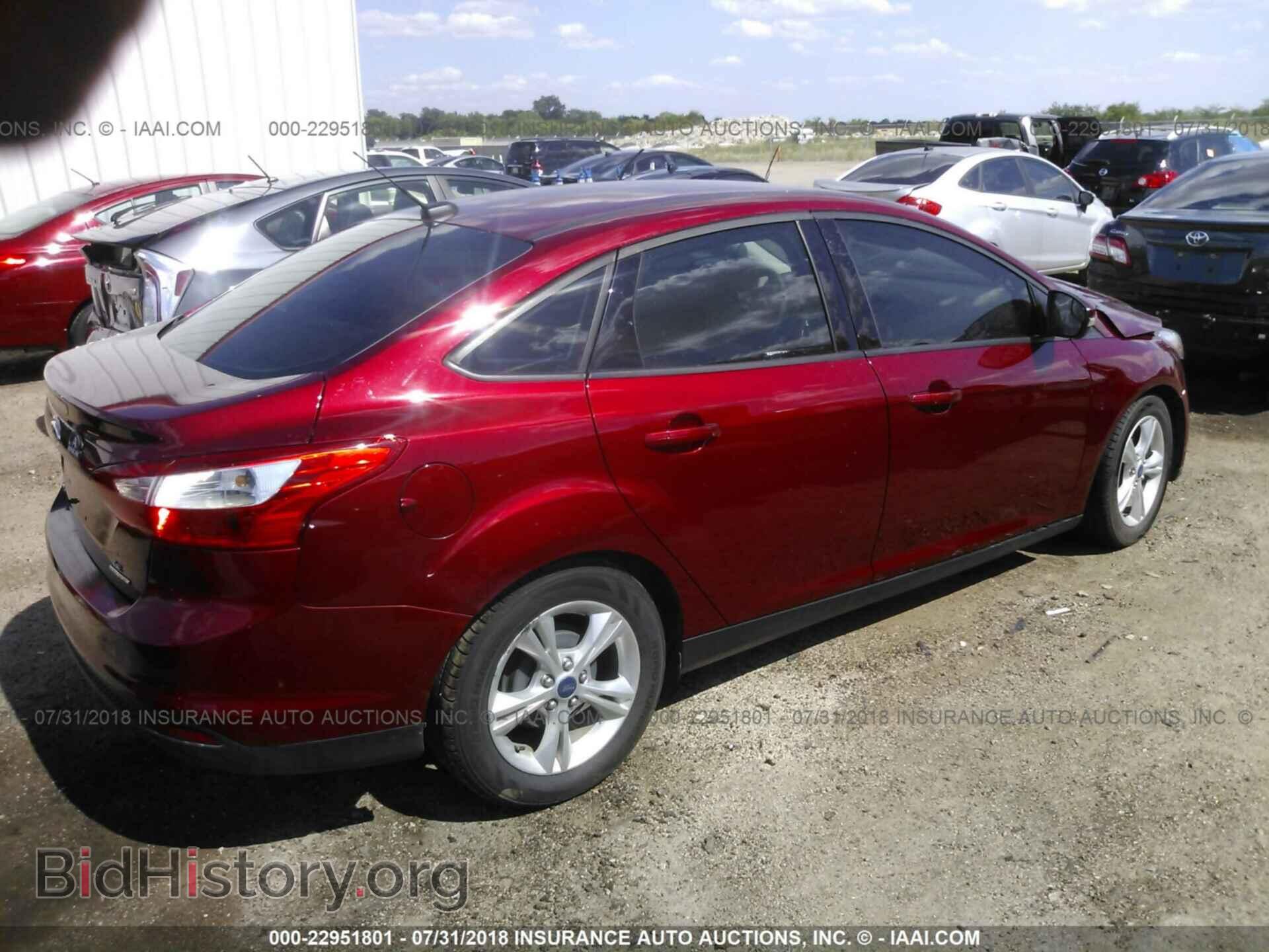 2014 Ford Focus - VIN: 1FADP3F2XEL108659 - Photo 4