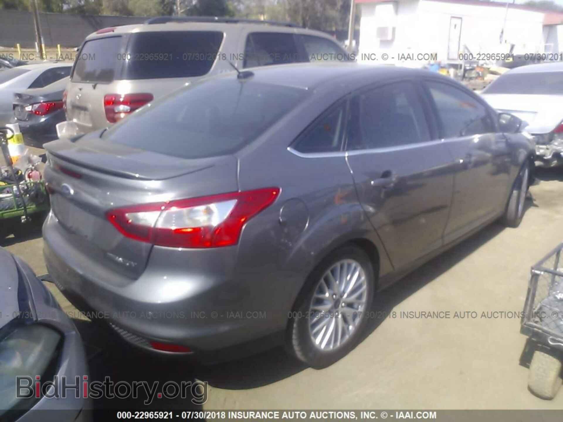 2014 Ford Focus - VIN: 1FADP3J2XEL176547 - Photo 4