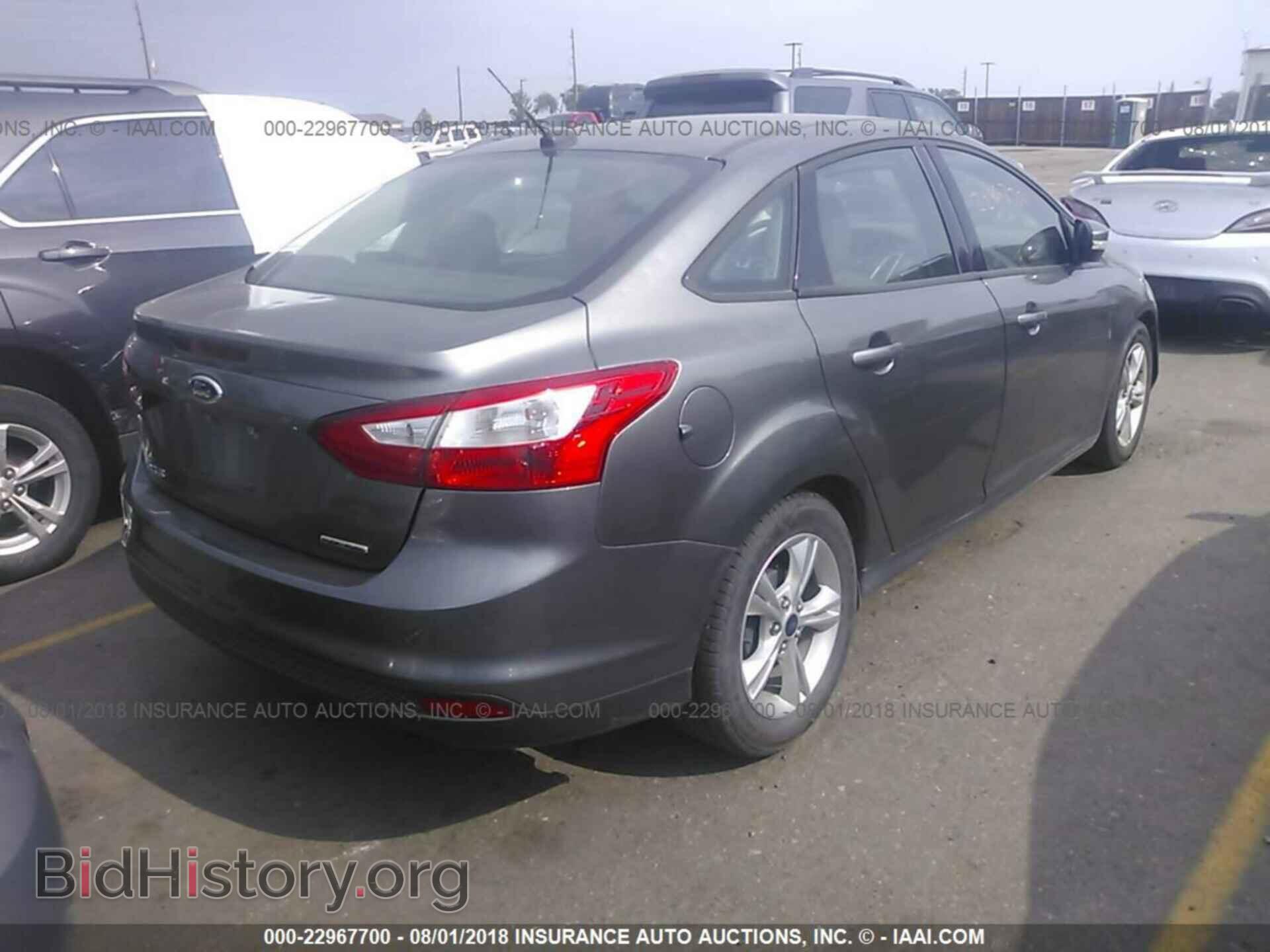 2014 Ford Focus - VIN: 1FADP3F23EL247287 - Фото 4