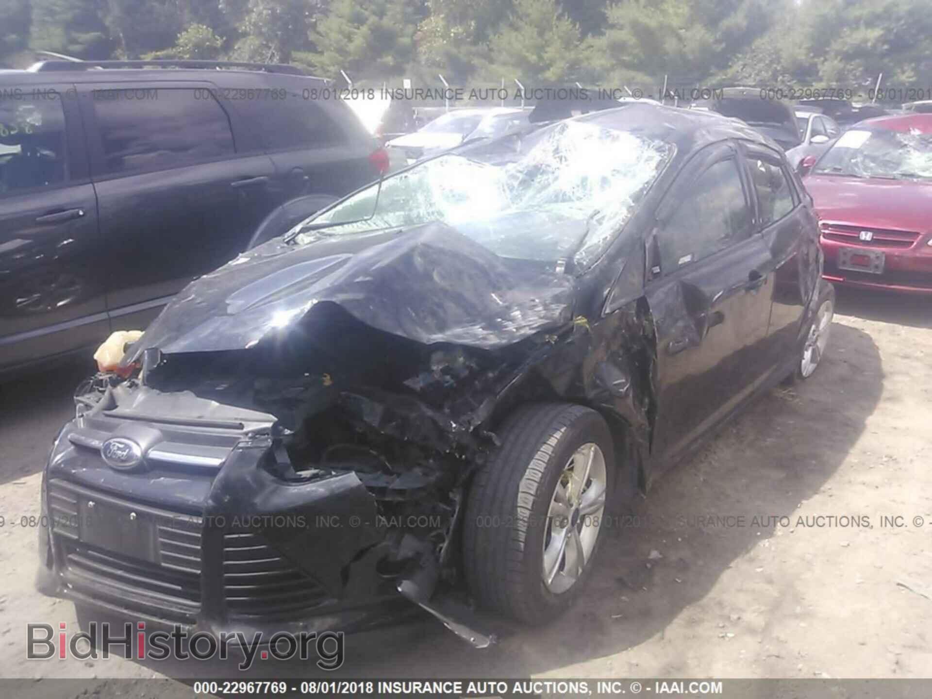 2014 Ford Focus - VIN: 1FADP3F24EL205355 - Photo 2