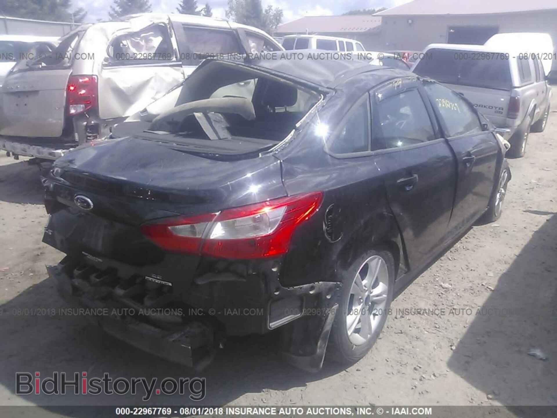 2014 Ford Focus - VIN: 1FADP3F24EL205355 - Photo 4
