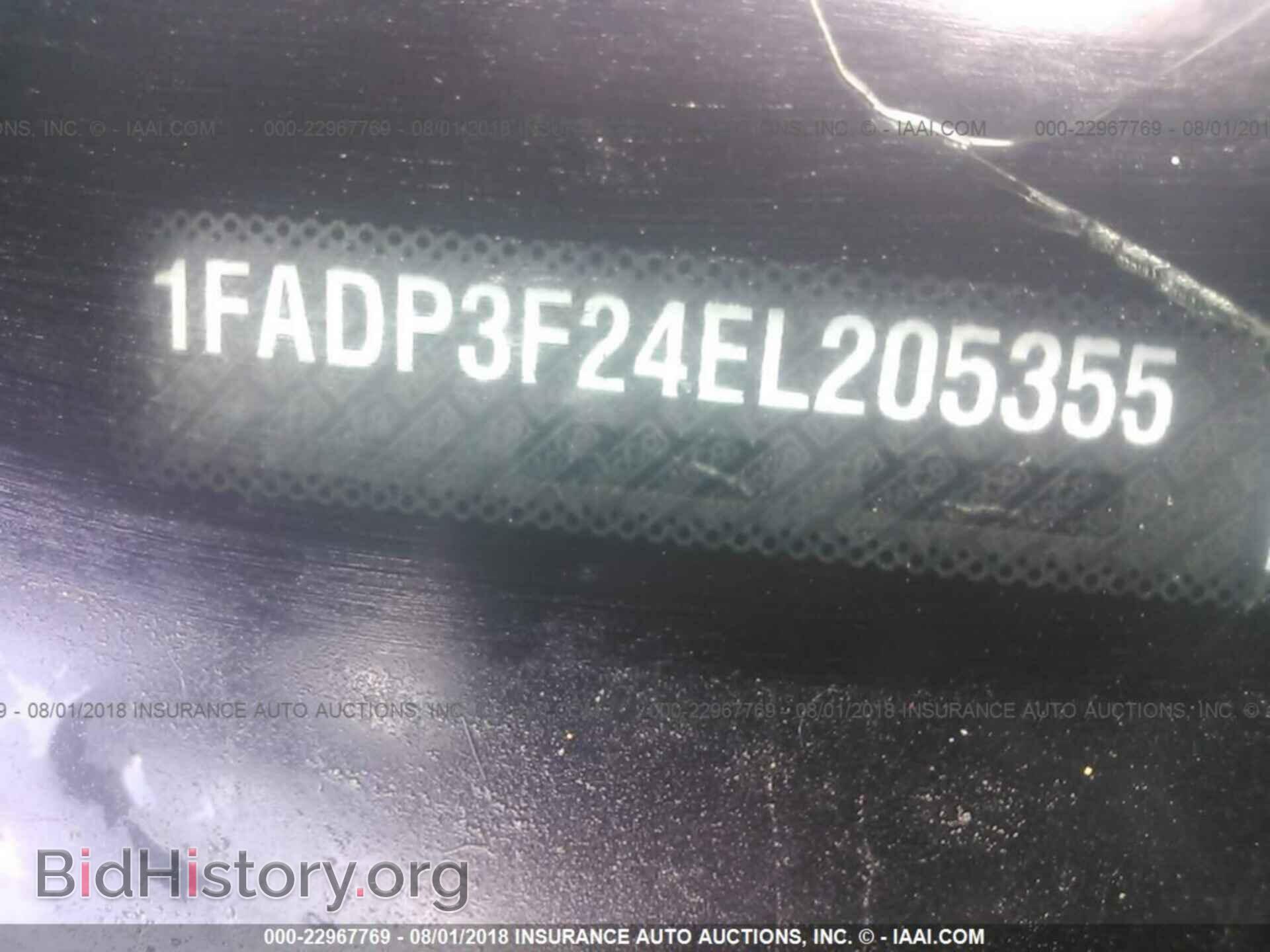 2014 Ford Focus - VIN: 1FADP3F24EL205355 - Photo 9