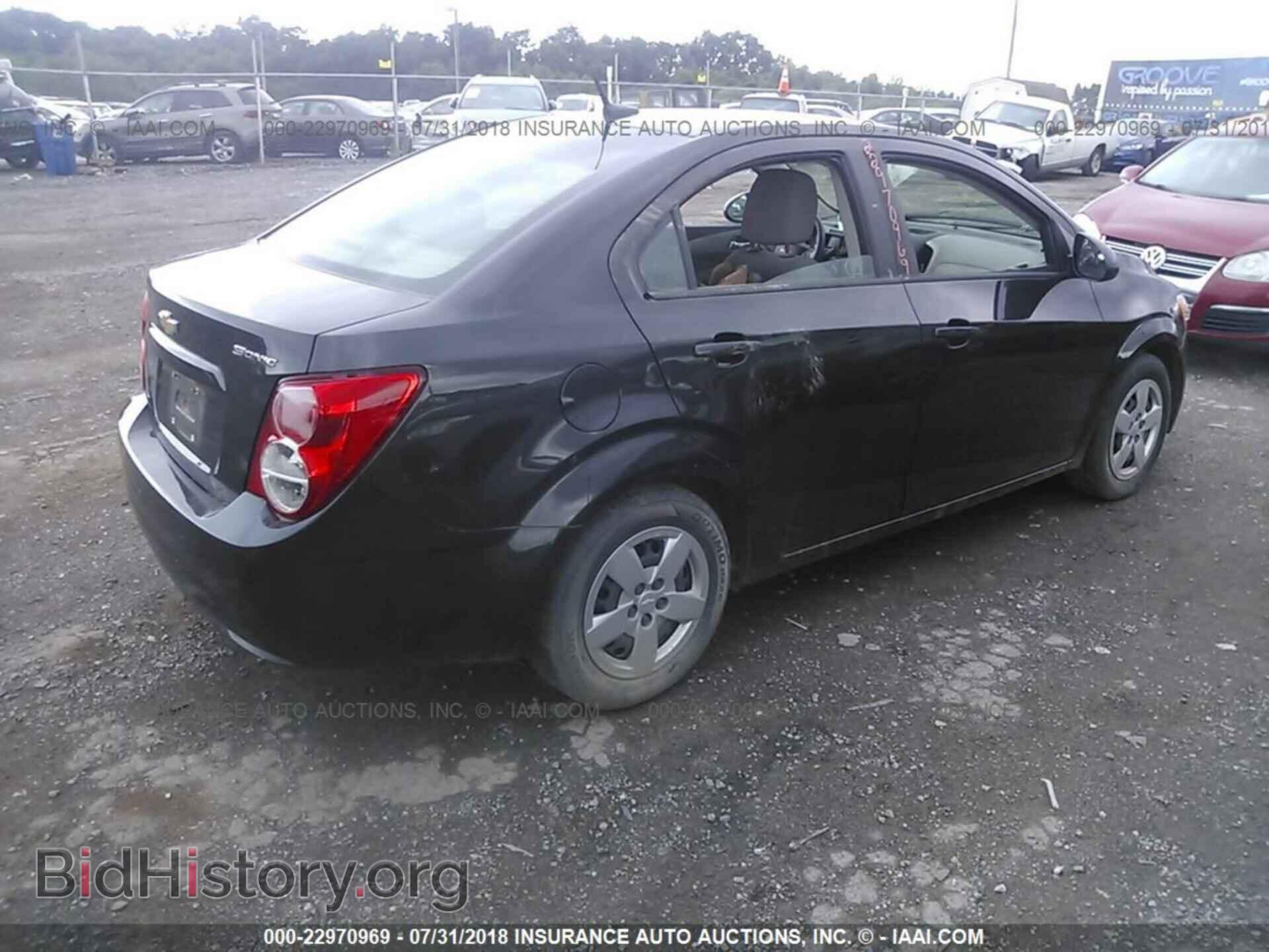 2014 Chevrolet Sonic - VIN: 1G1JA5SG4E4147228 - Photo 4