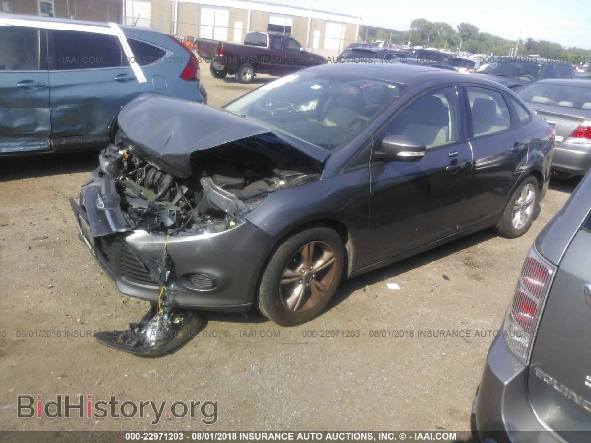 2014 Ford Focus - VIN: 1FADP3F21EL149357 - Фото 2