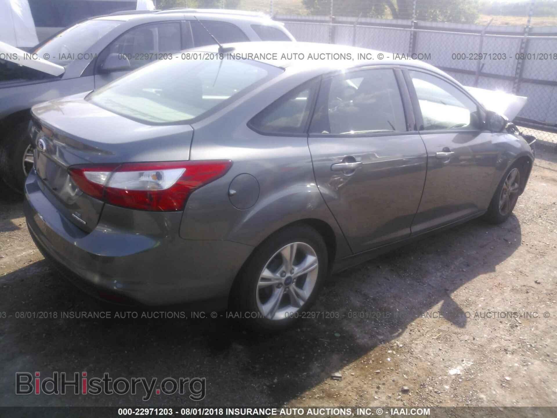 2014 Ford Focus - VIN: 1FADP3F21EL149357 - Фото 4