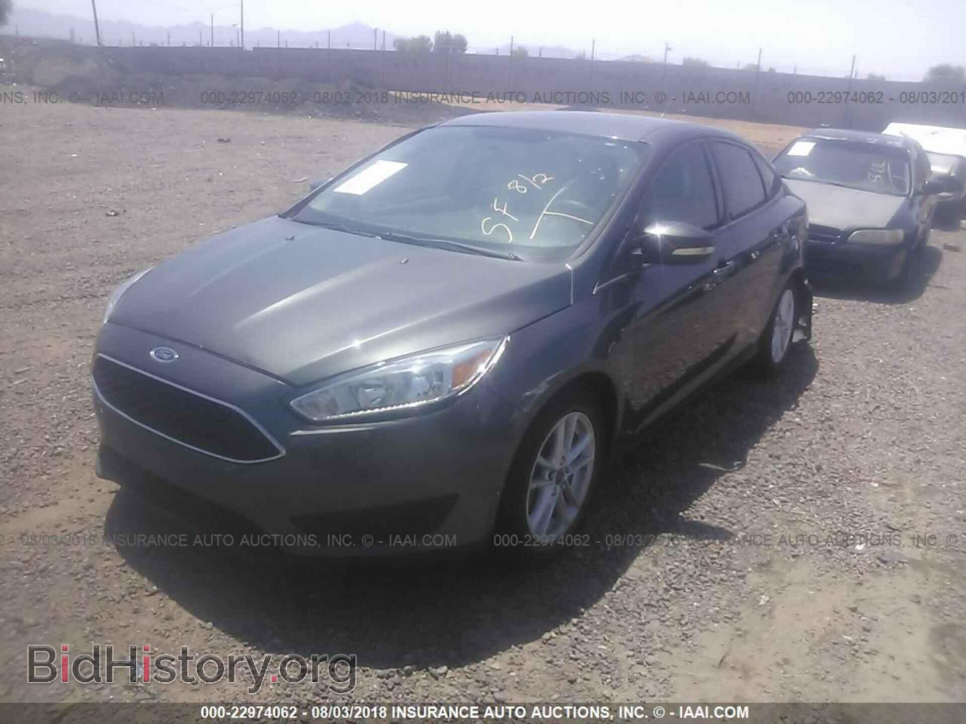 2015 Ford Focus - VIN: 1FADP3F2XFL211100 - Фото 2