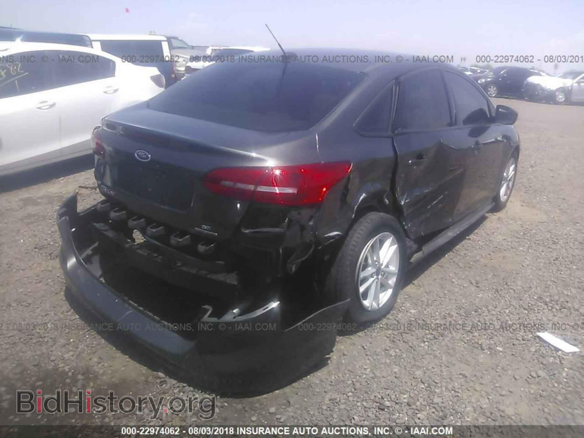 2015 Ford Focus - VIN: 1FADP3F2XFL211100 - Фото 4