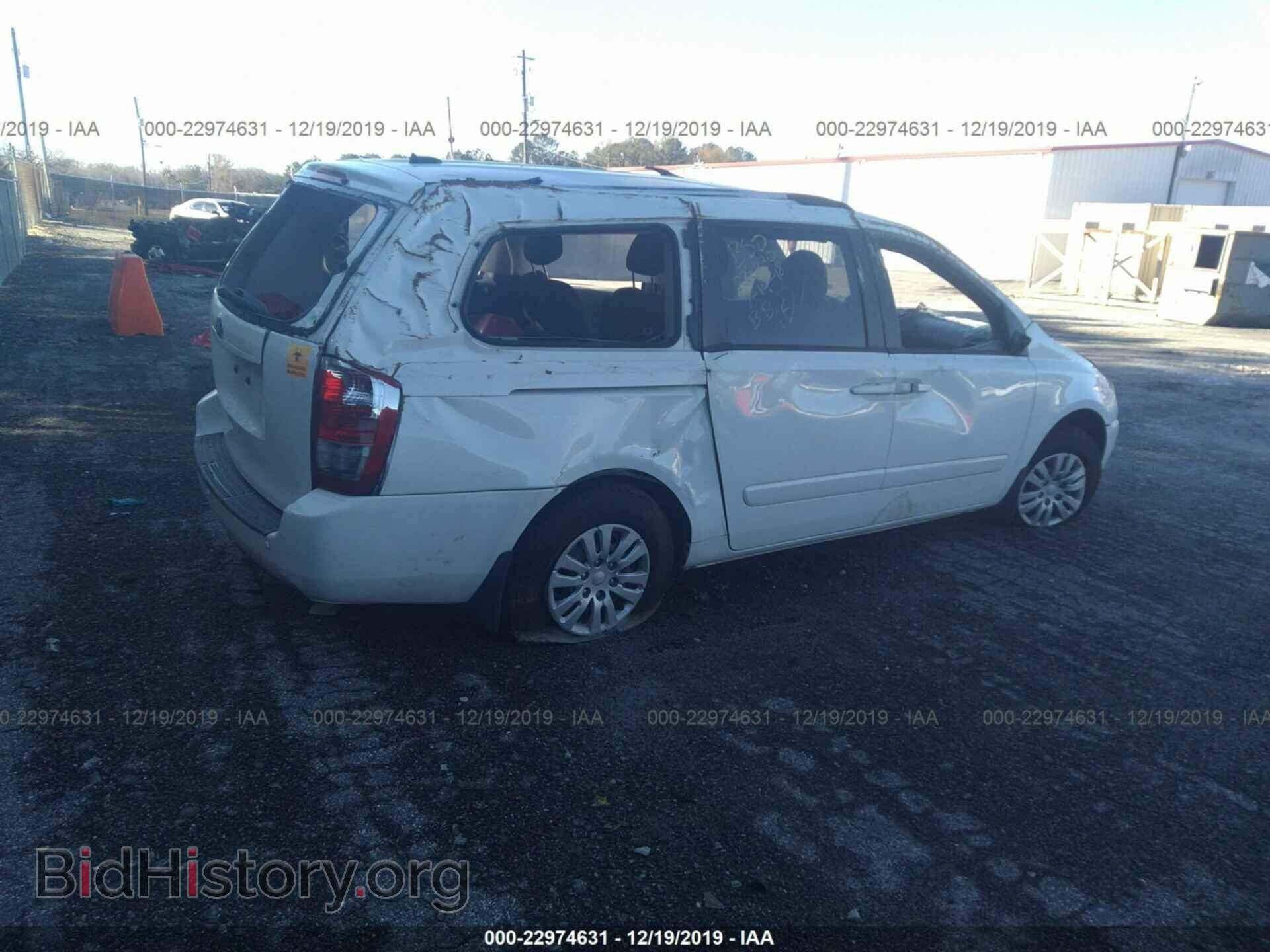 2014 KIA Sedona - VIN: KNDMG4C75E6536637 - Фото 4