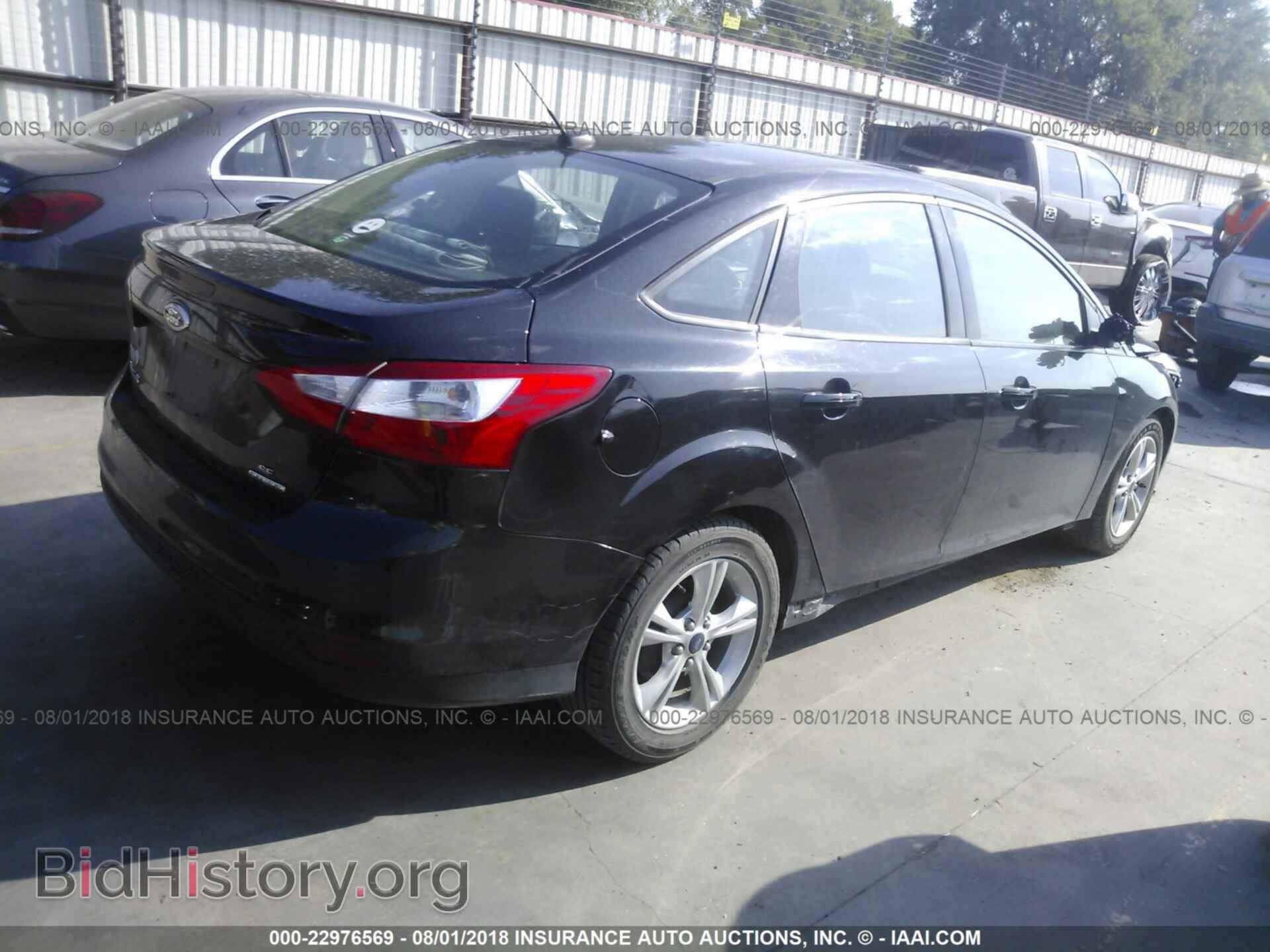 2014 Ford Focus - VIN: 1FADP3F27EL354942 - Photo 4