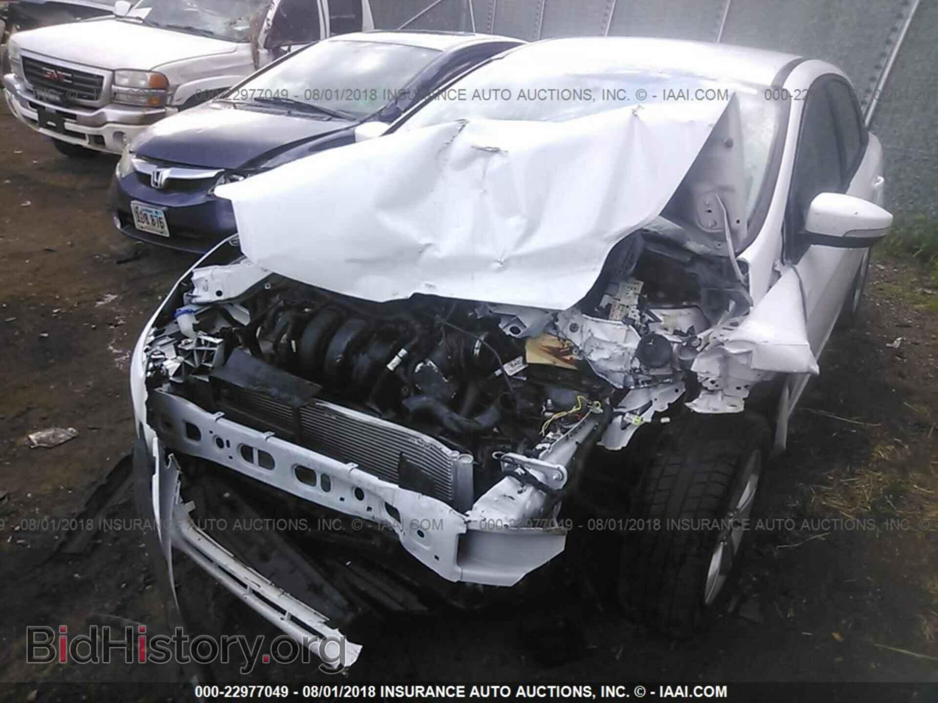 2014 Ford Focus - VIN: 1FADP3F25EL420758 - Фото 2