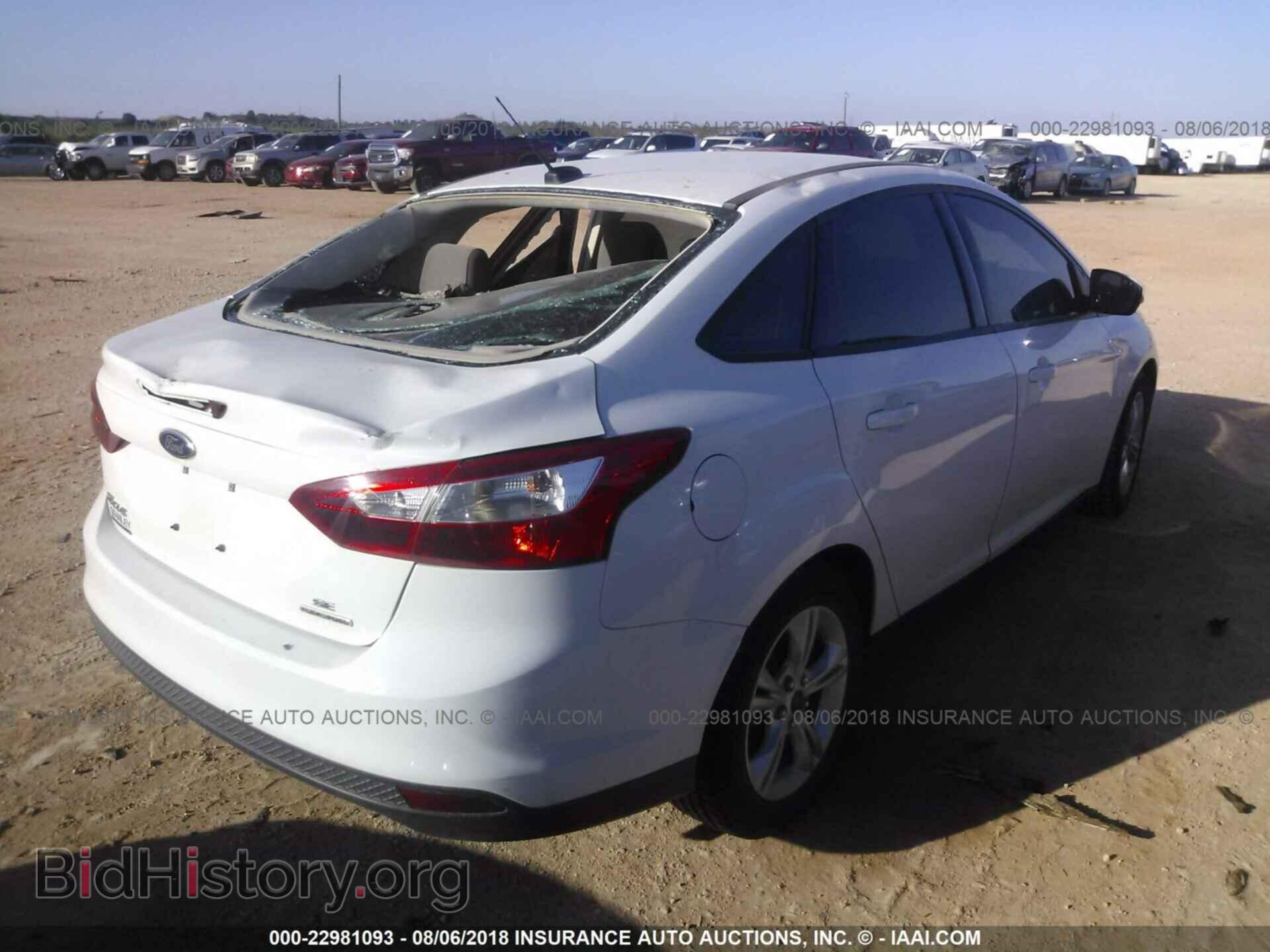 2014 Ford Focus - VIN: 1FADP3F28EL362533 - Фото 4