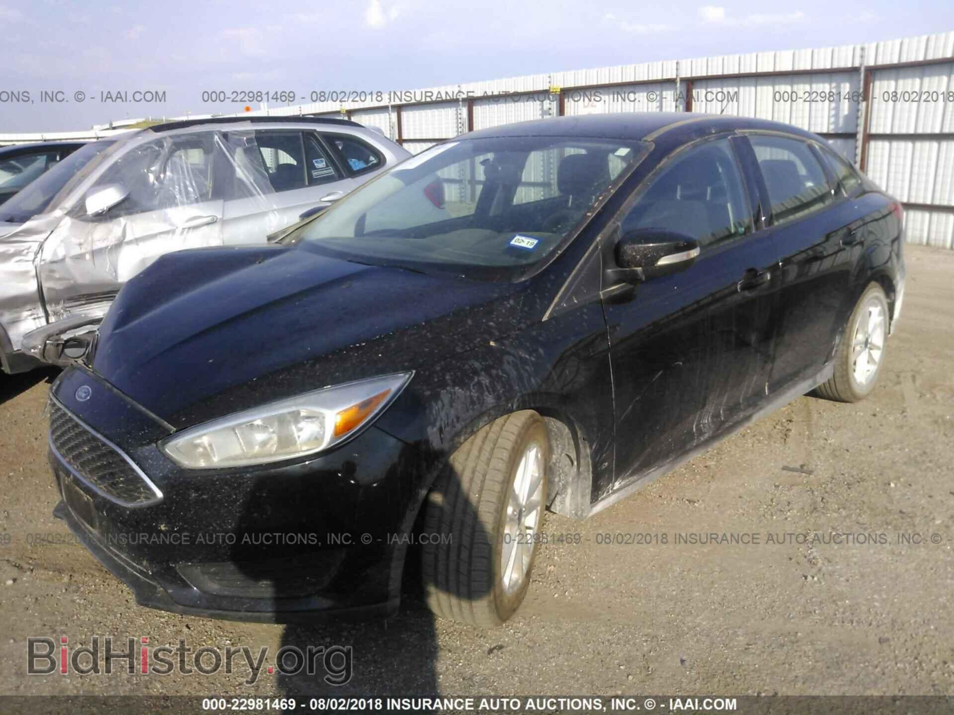 2016 Ford Focus - VIN: 1FADP3F24GL404697 - Photo 2