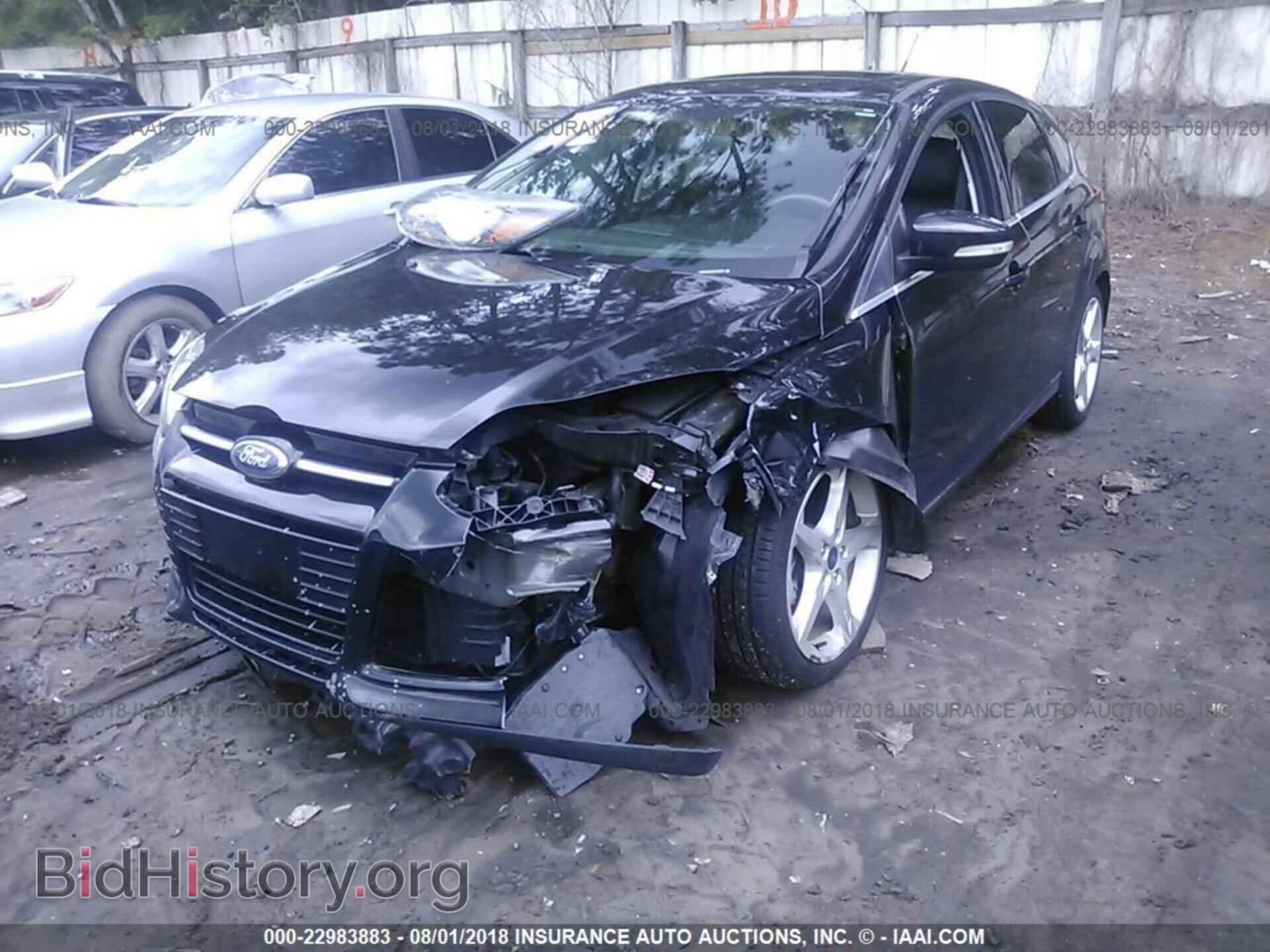 2014 Ford Focus - VIN: 1FADP3N28EL403339 - Фото 2