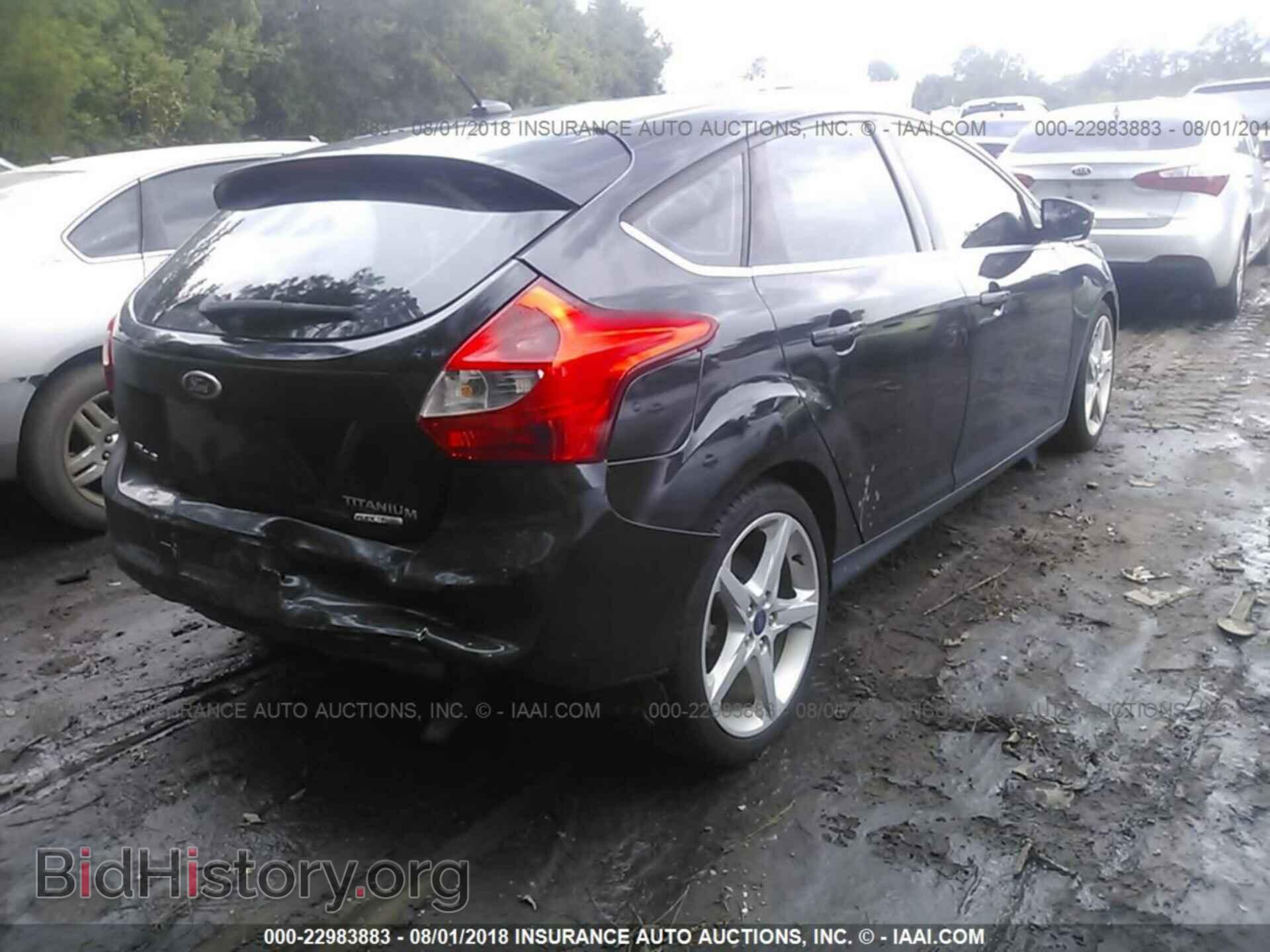2014 Ford Focus - VIN: 1FADP3N28EL403339 - Фото 4