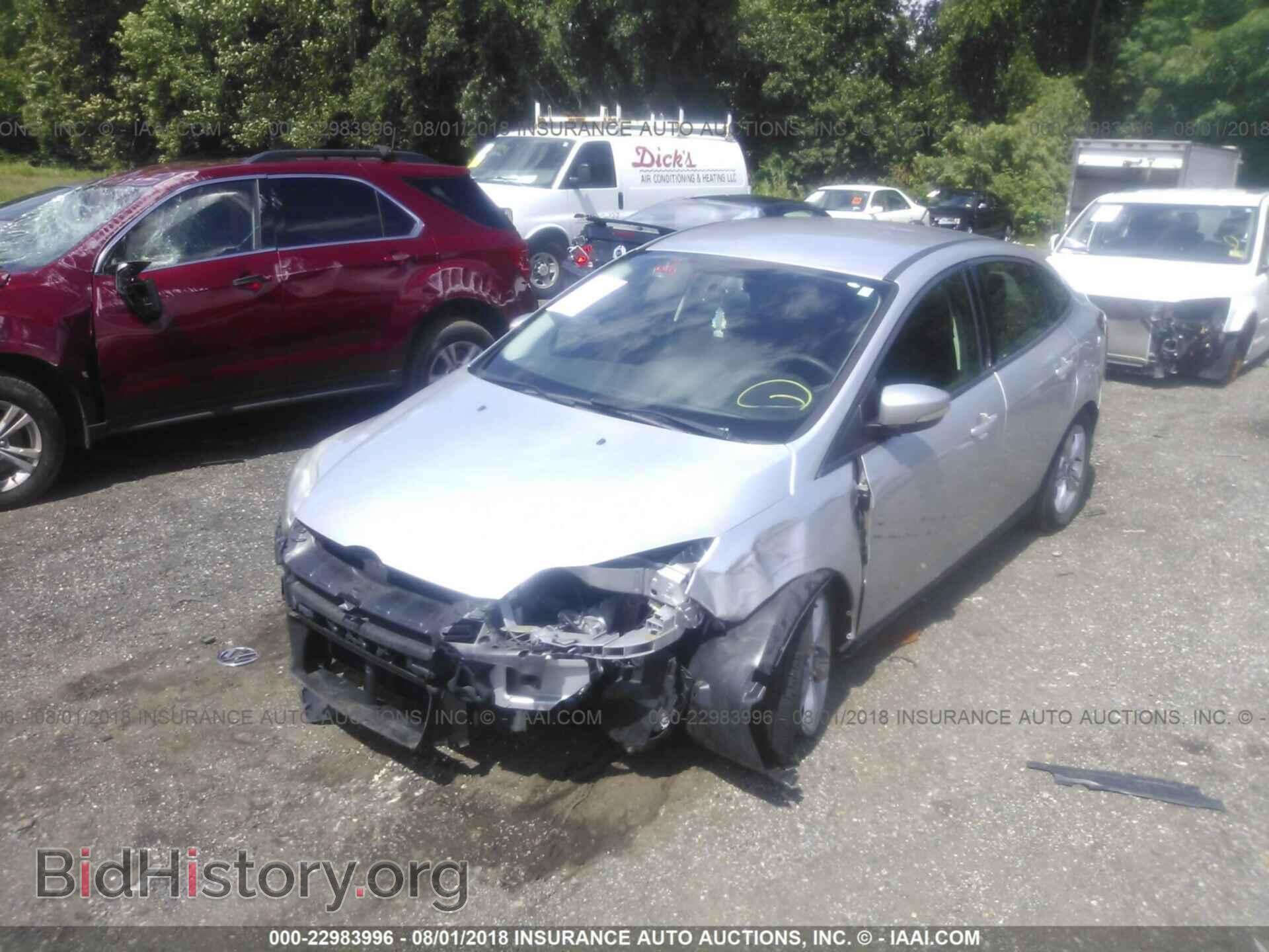 2014 Ford Focus - VIN: 1FADP3F21EL104628 - Photo 2